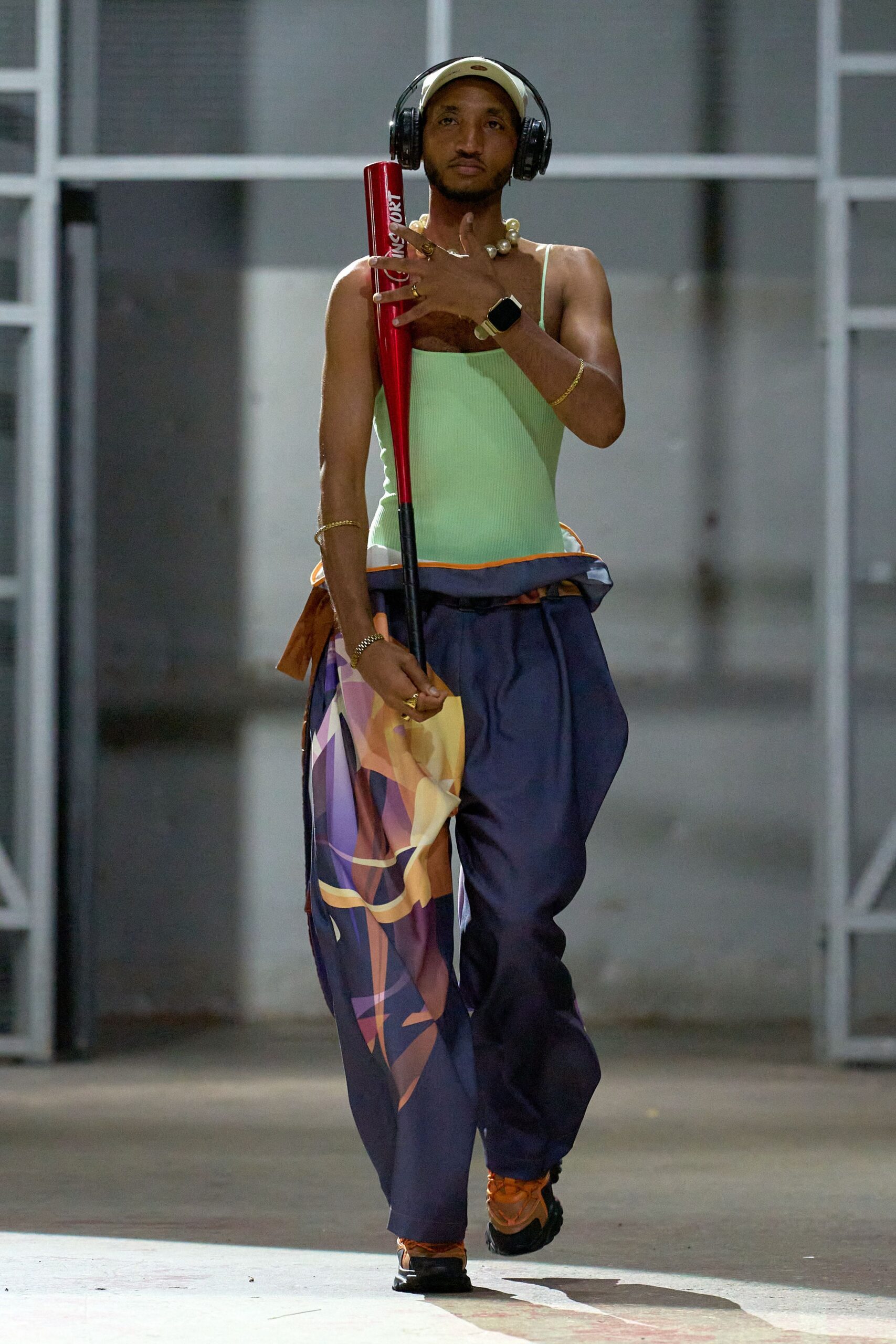 green tank-top blue printed pants