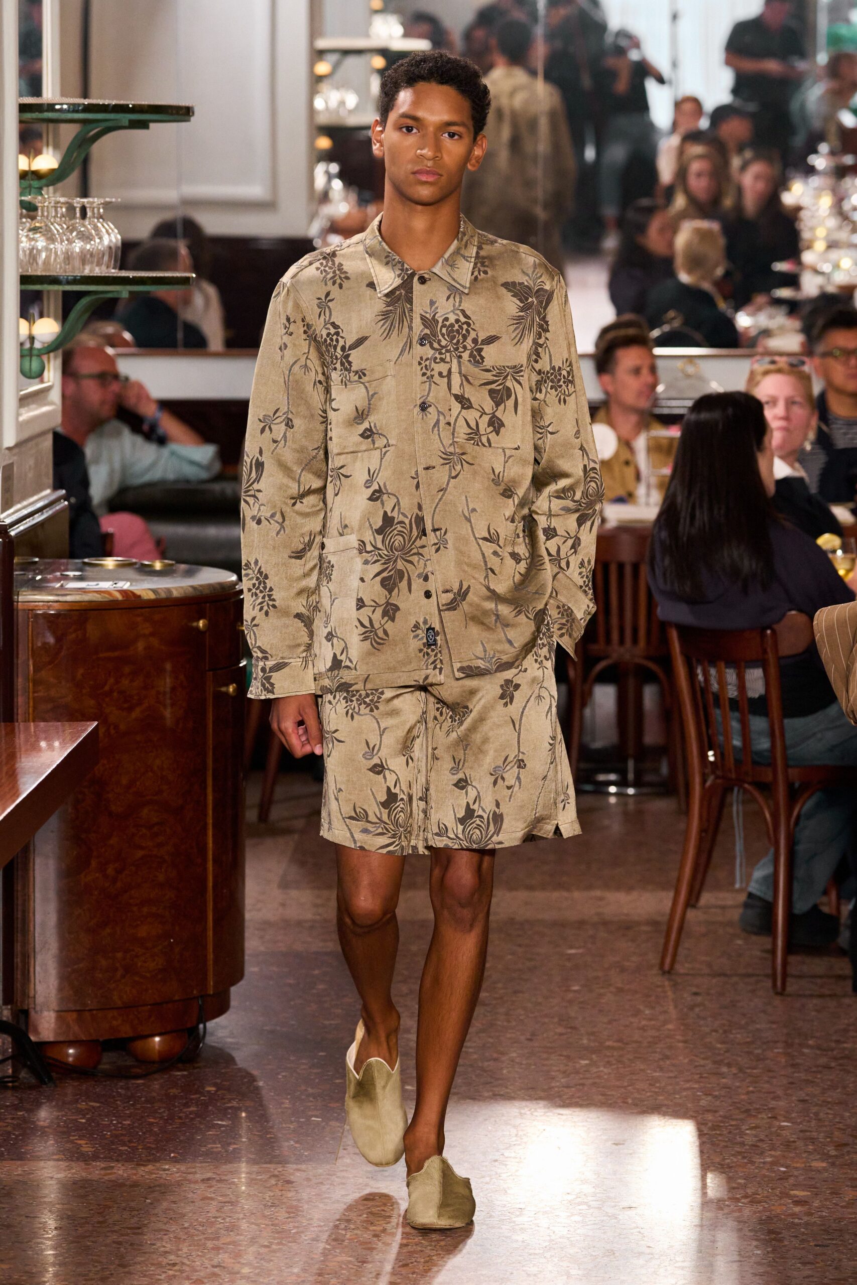 beige floral shirt and shorts