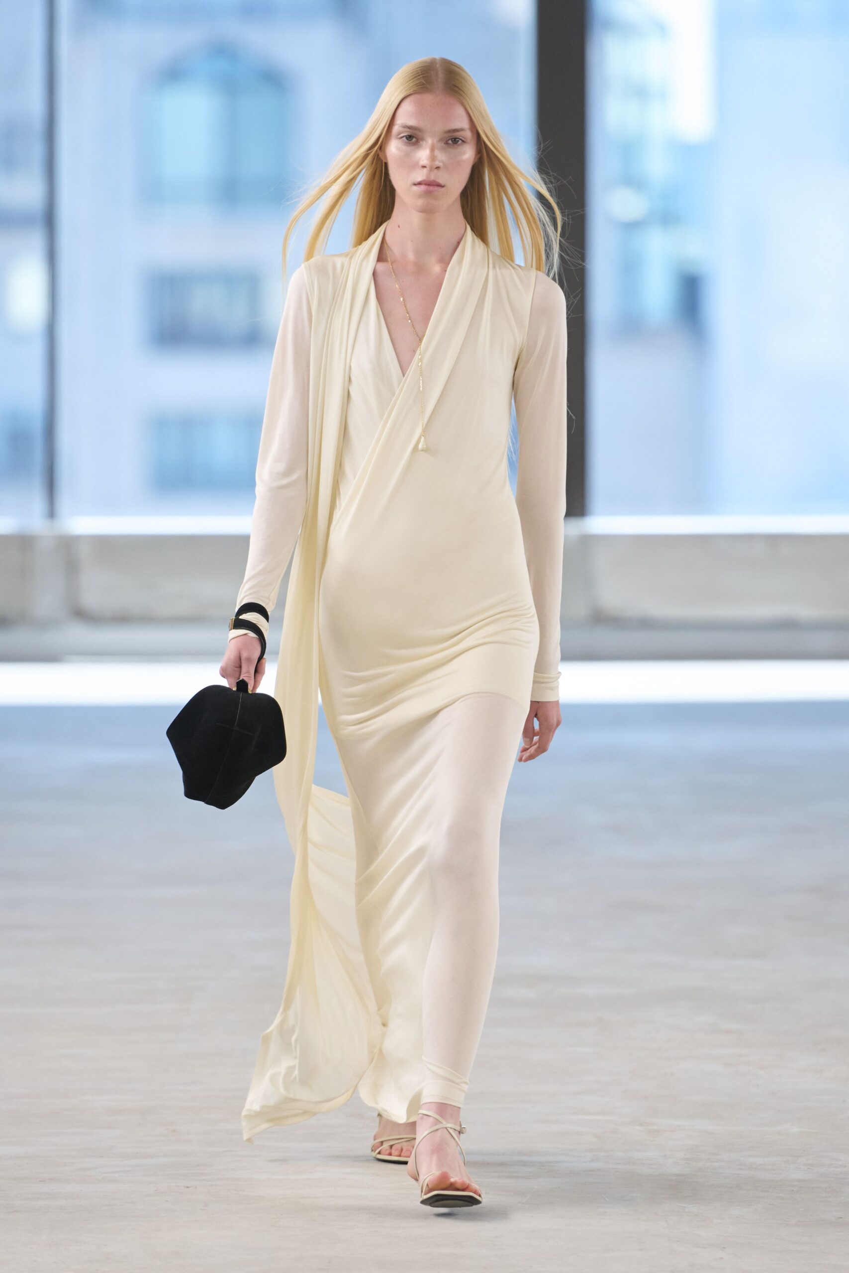 ivory silk sleeveless v-neck fitted draped flowing gown