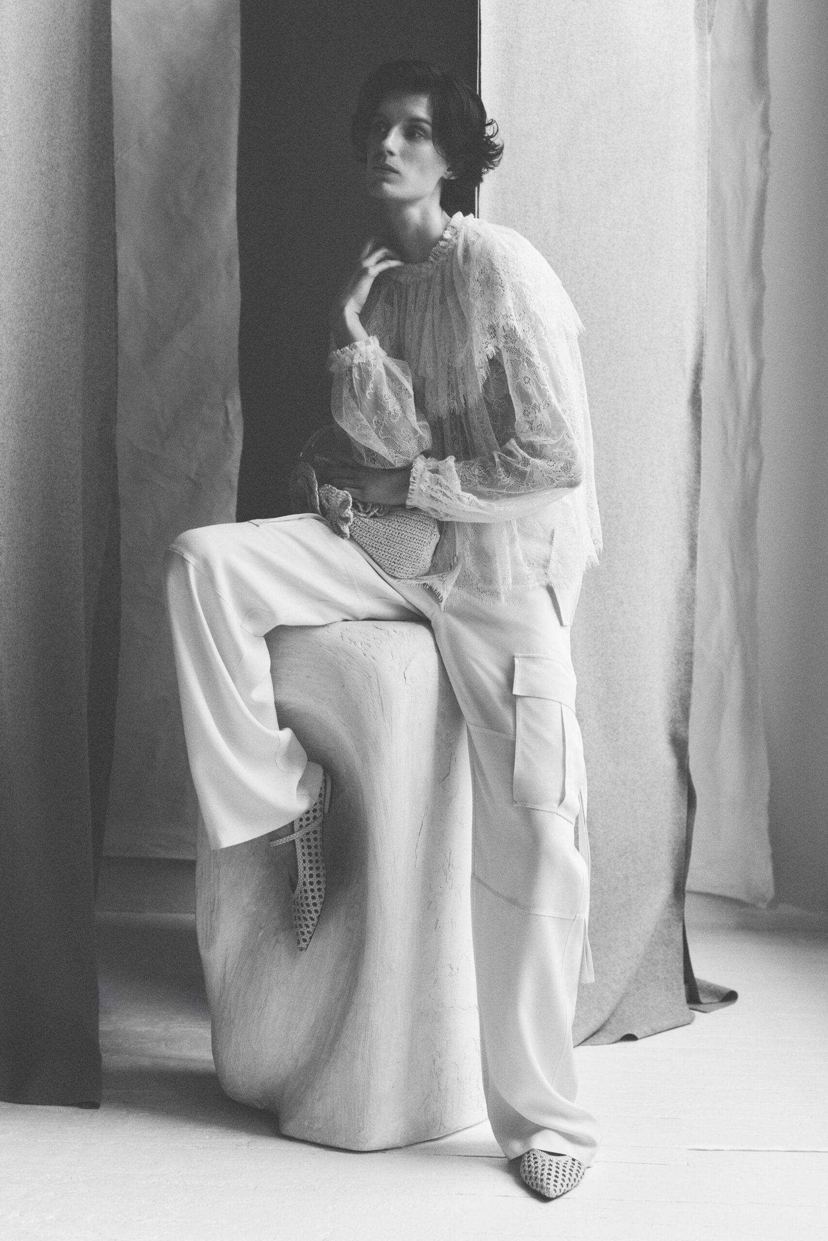 white lace long-sleeve high-neck relaxed ruffled blouse