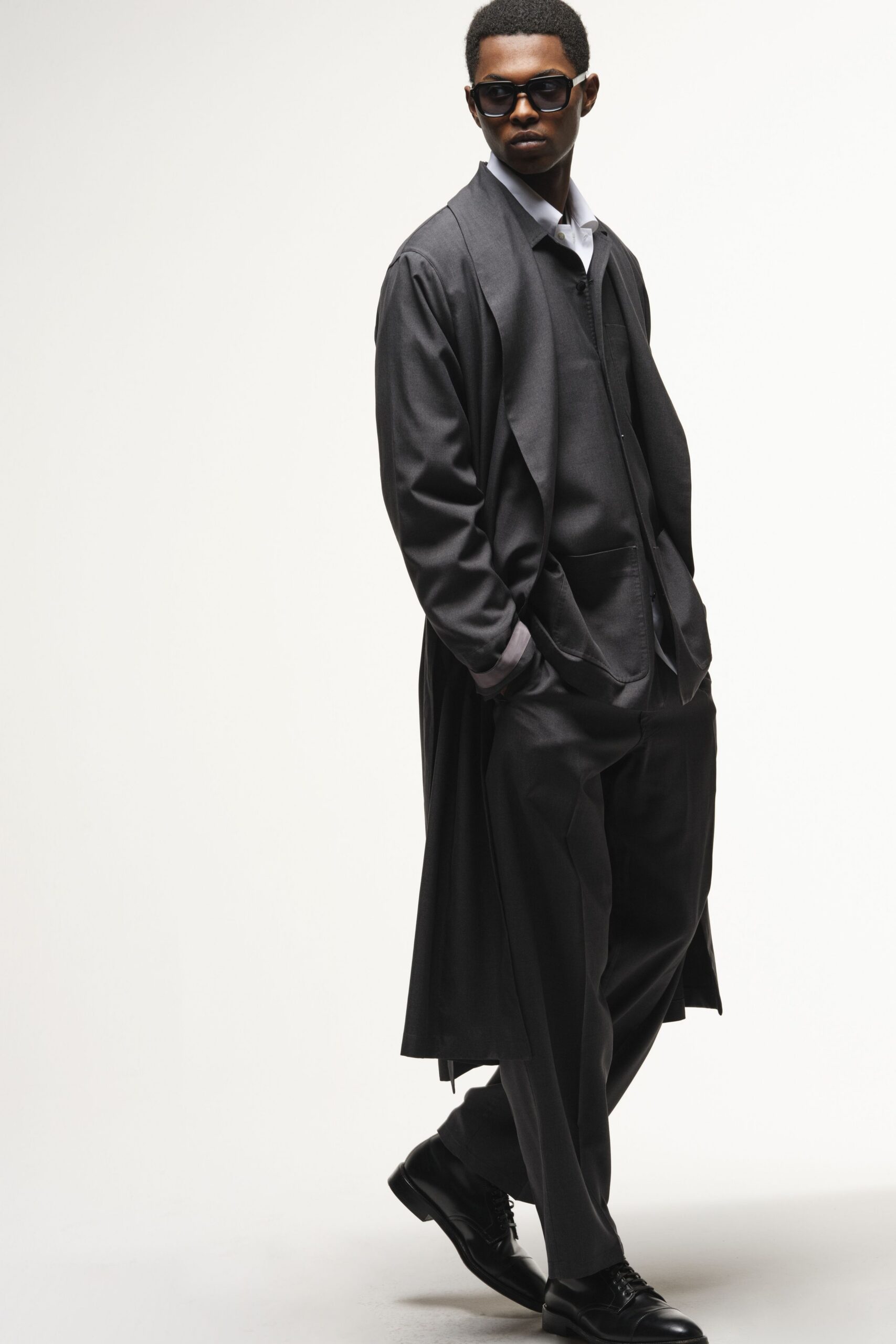 black coat with white shirt