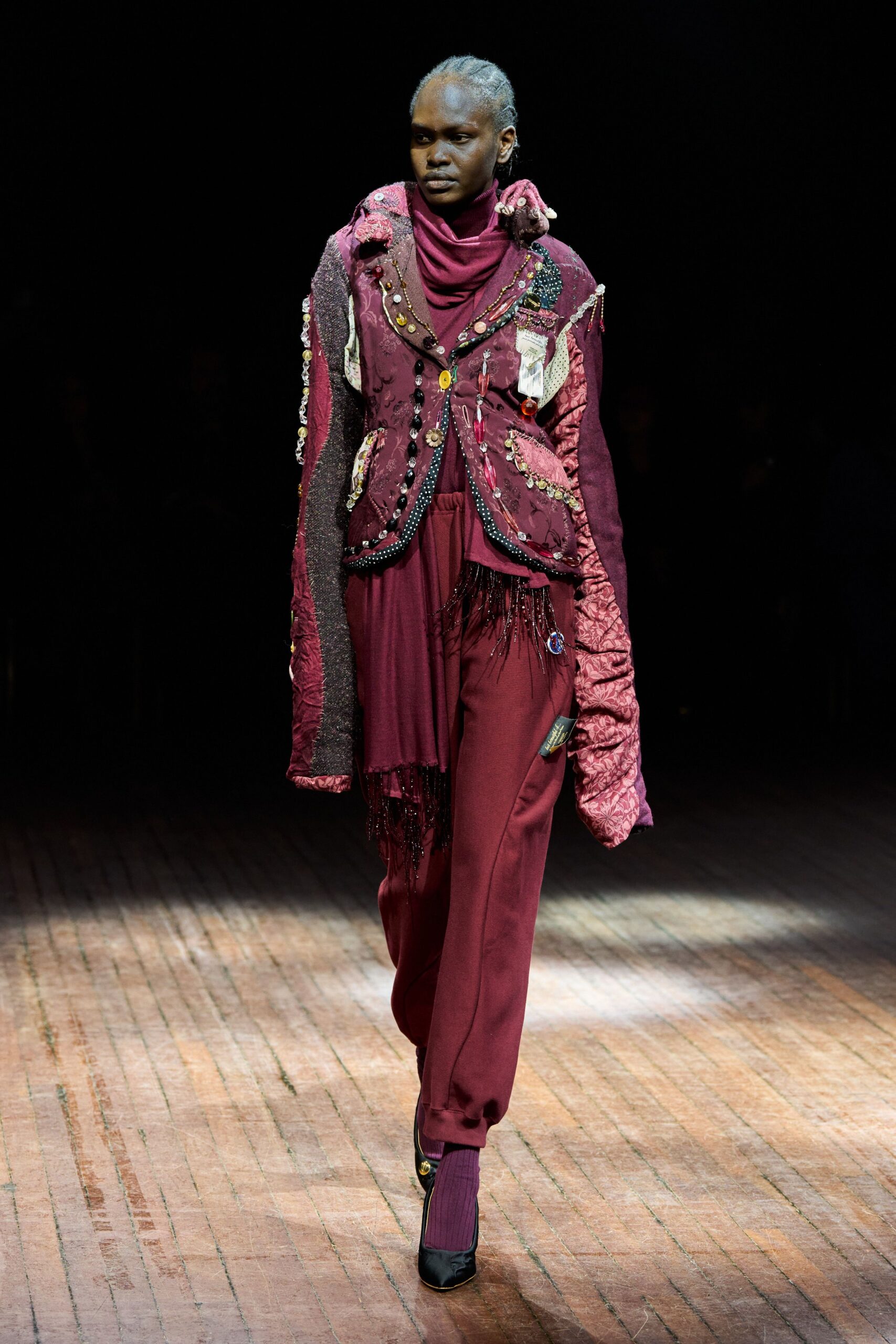 purple embroidered blazer with red pants