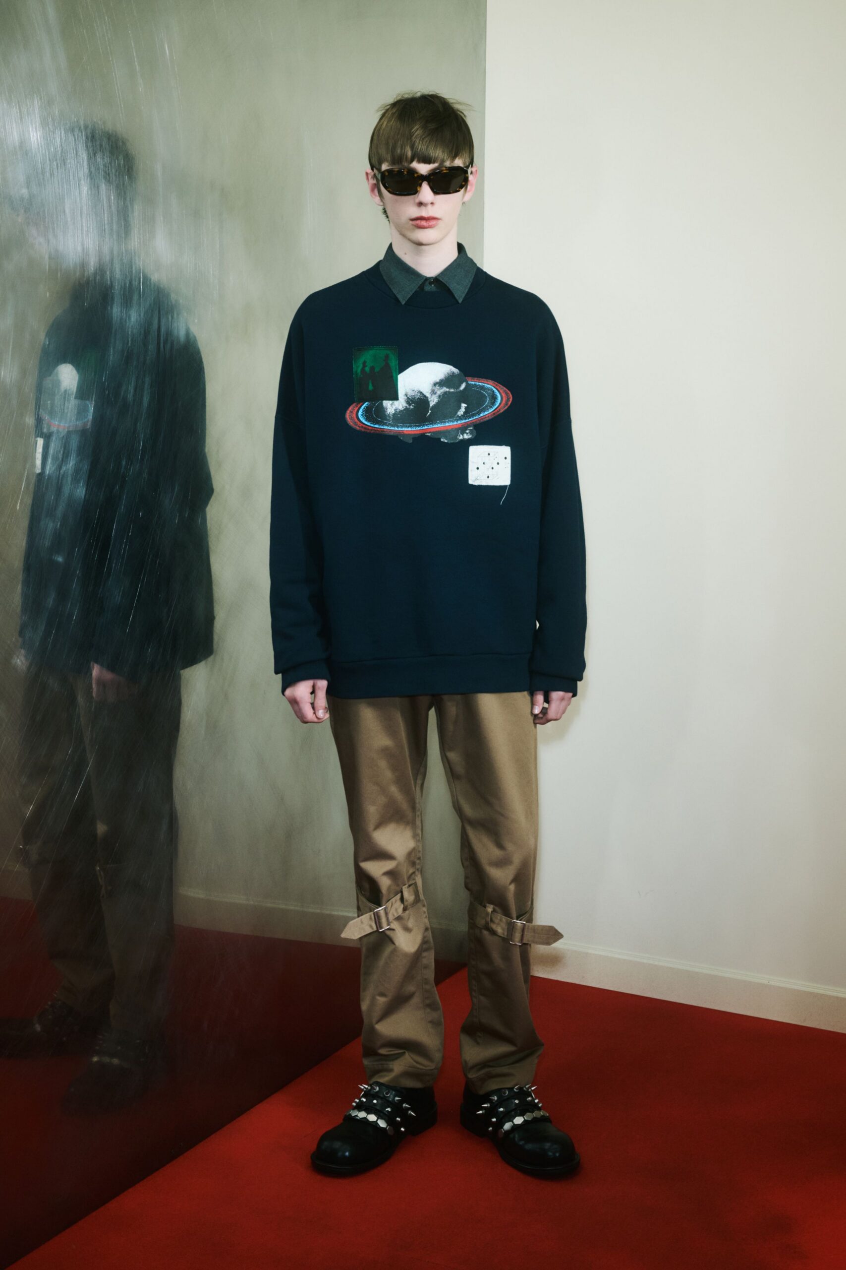 black cotton long-sleeve collared relaxed printed sweater