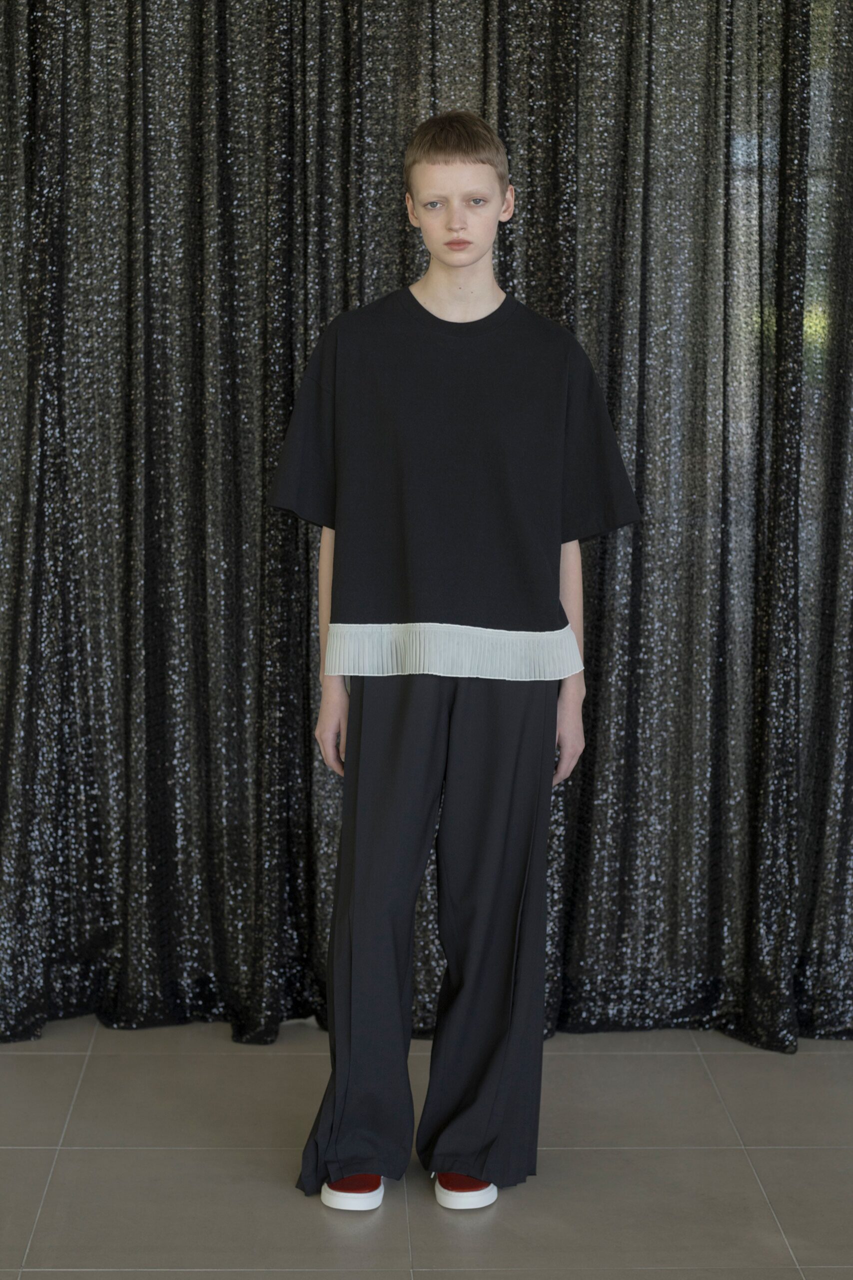 black relaxed top with black pants