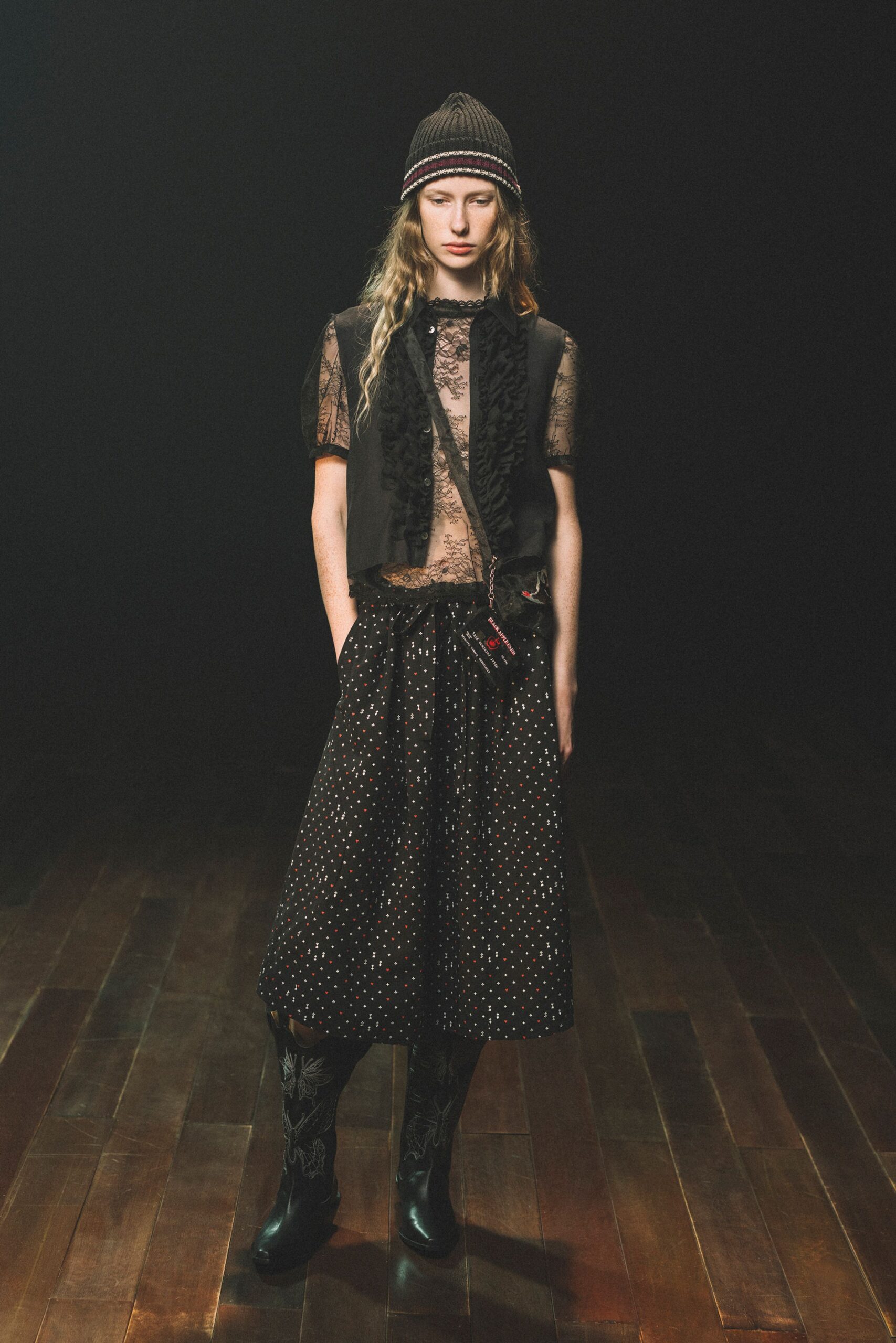 black lace top with vest and midi skirt