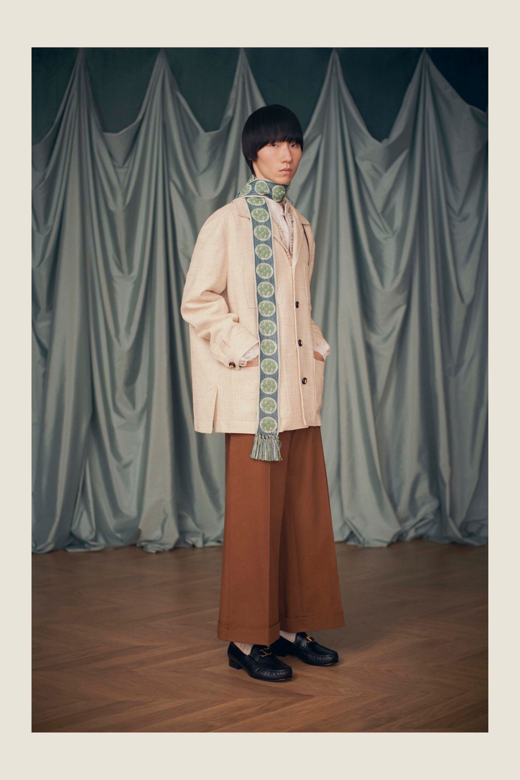 beige relaxed jacket with brown wide-leg pants