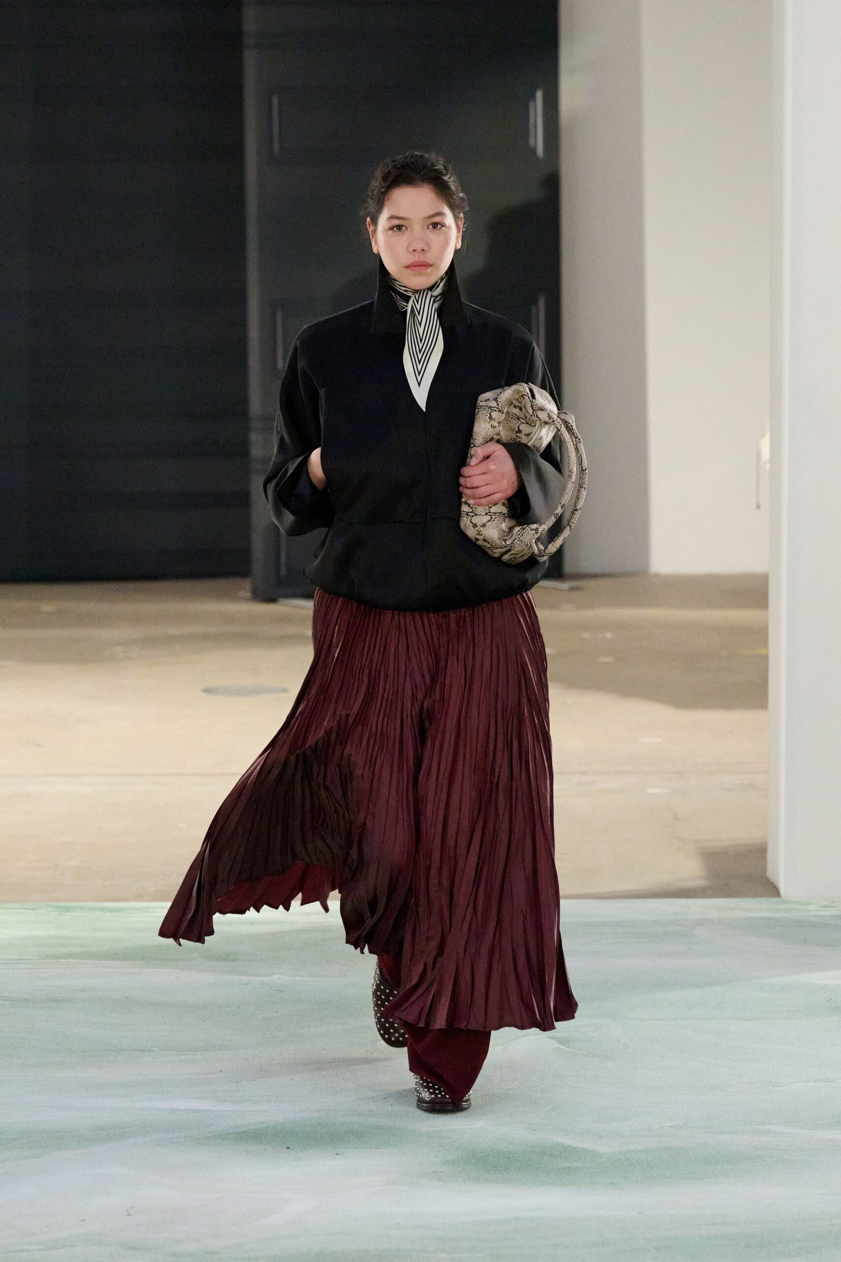 maroon silk fitted pleated flowing midi skirt