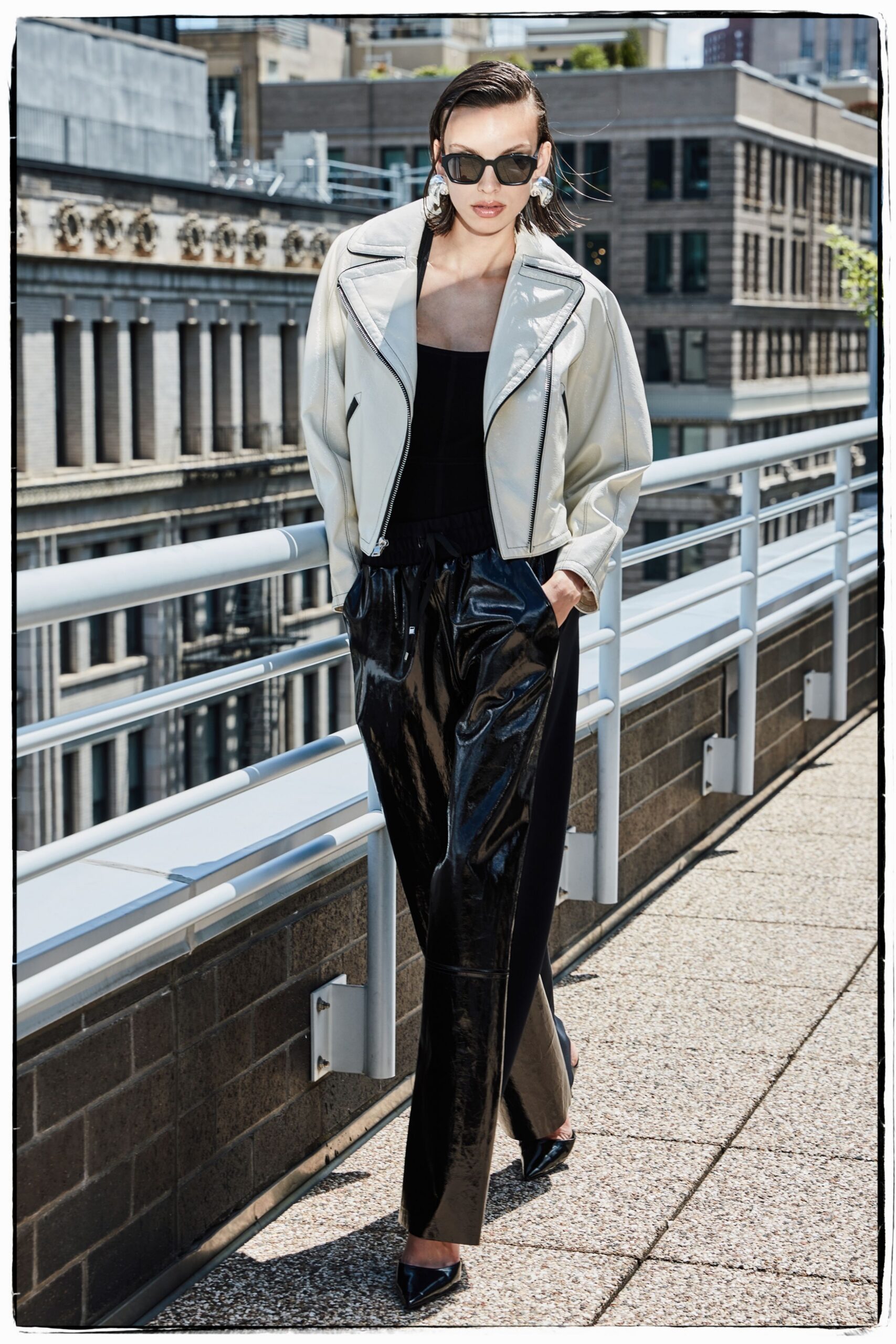 white leather long-sleeve collared fitted zippered jacket