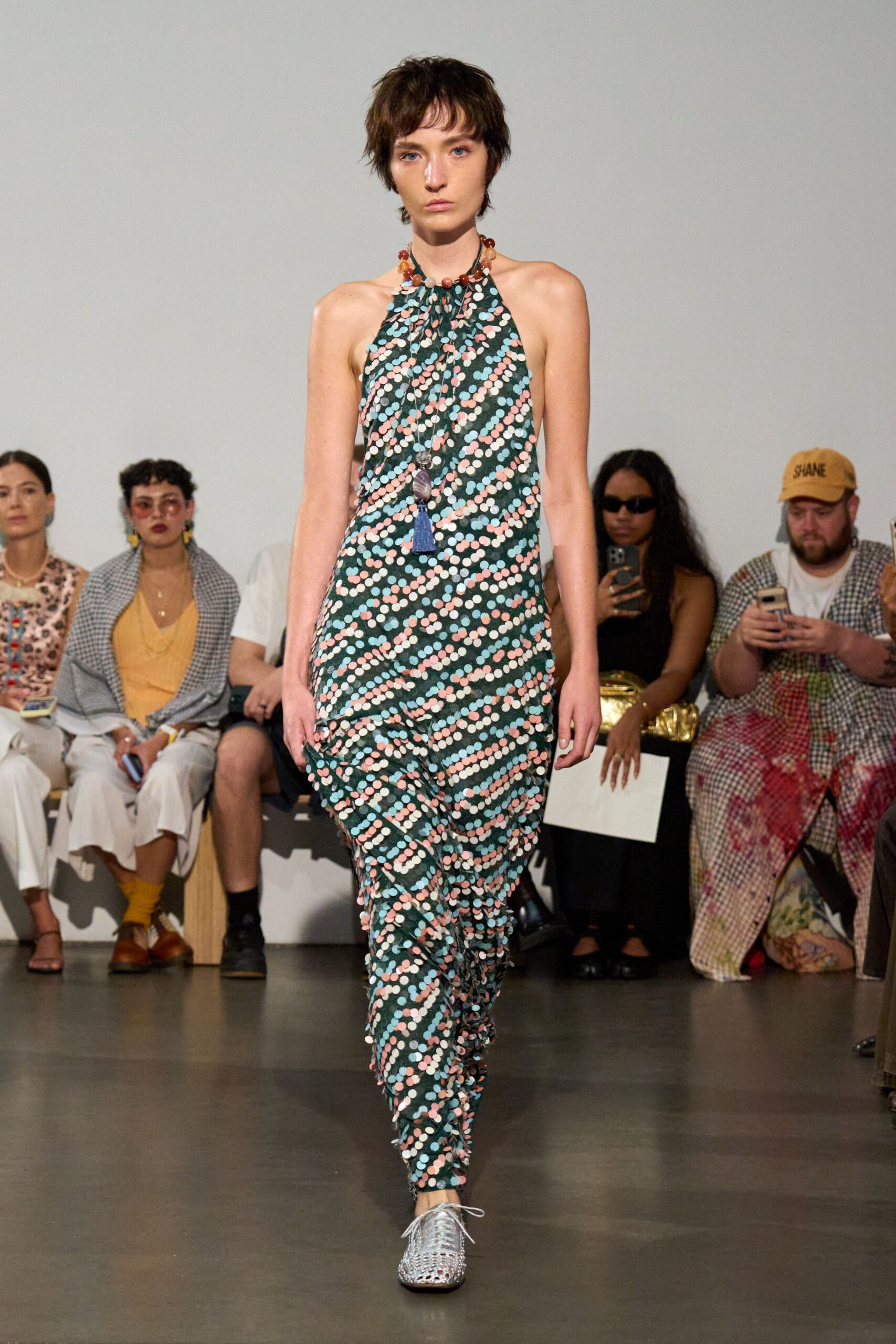 green cotton sleeveless halter fitted ruffled printed jumpsuit