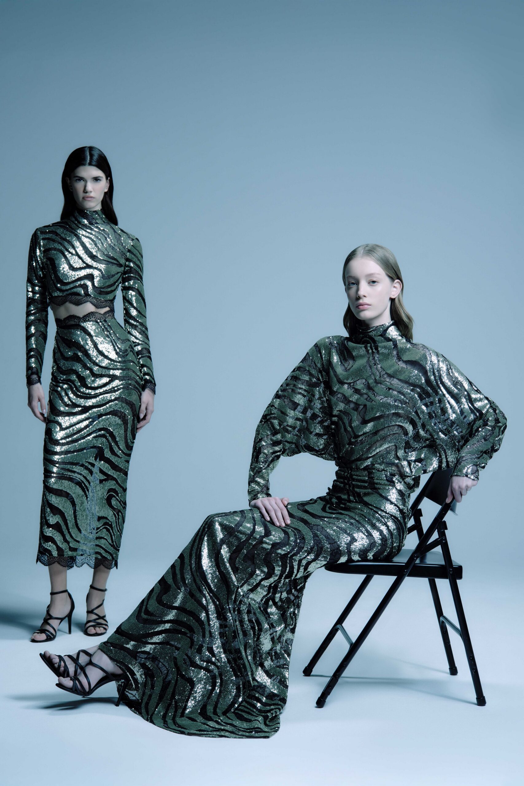 green sequin long-sleeve high-neck fitted flared shiny gown