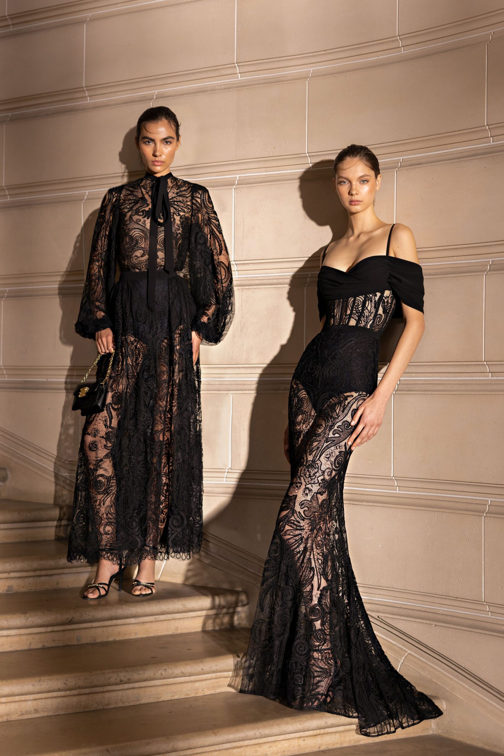 black lace sleeveless v-neck fitted embroidered flared gown
