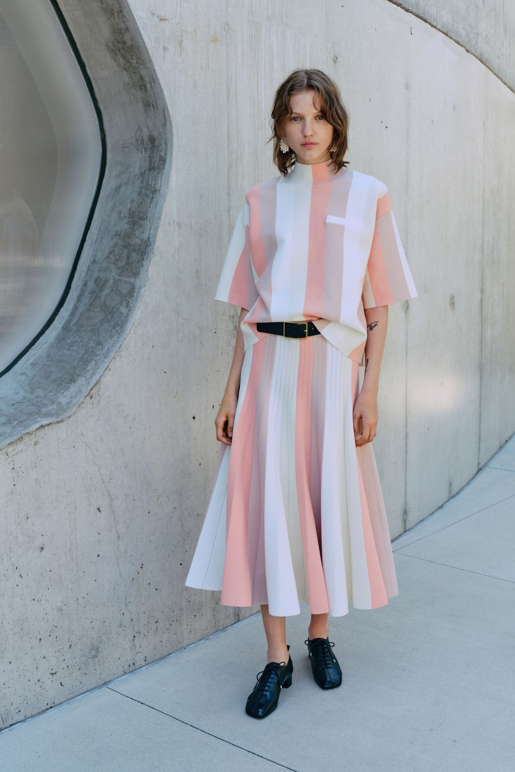 pink and white striped top with pleated skirt