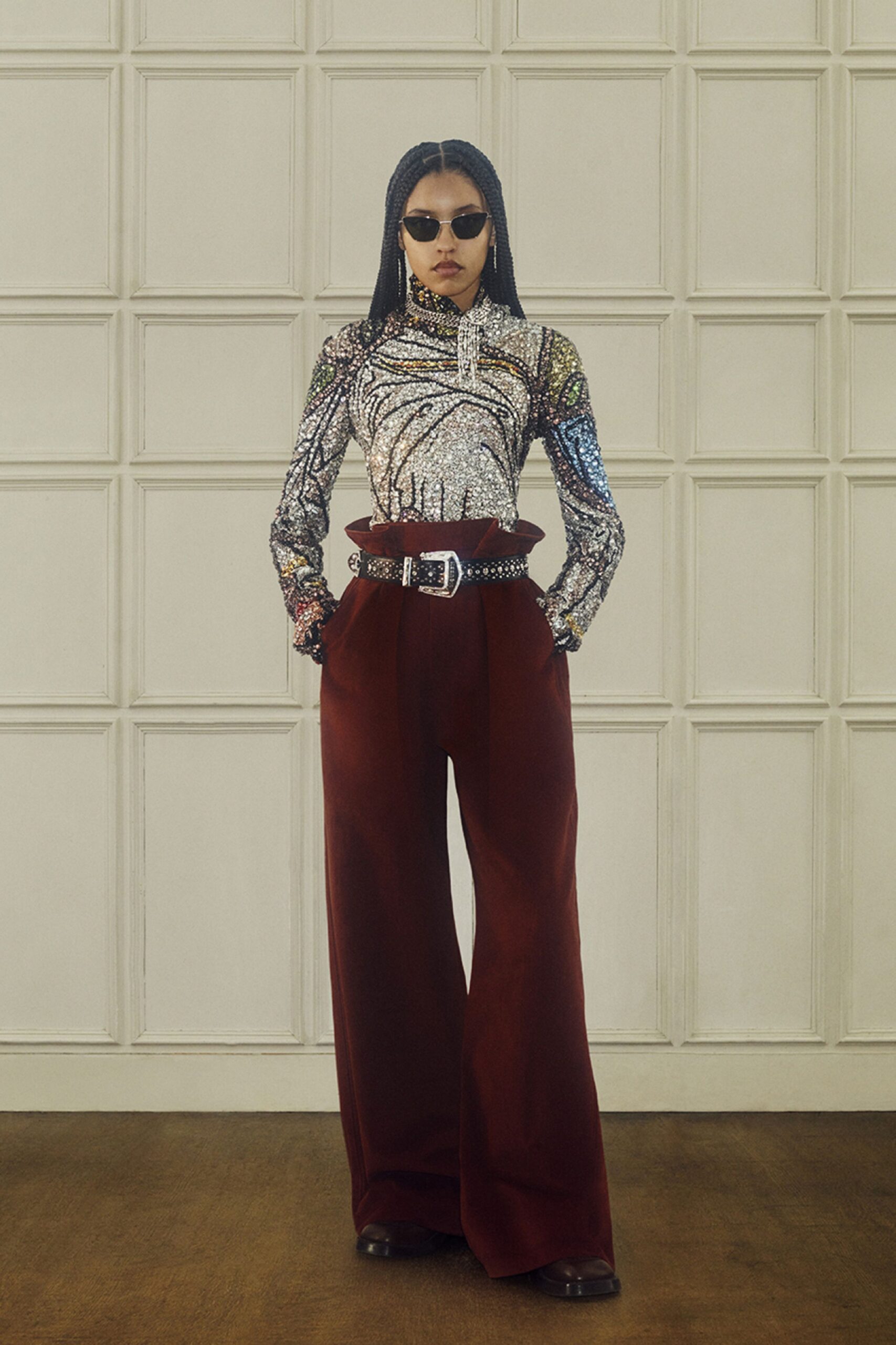 multi-sequin shirt with red pants