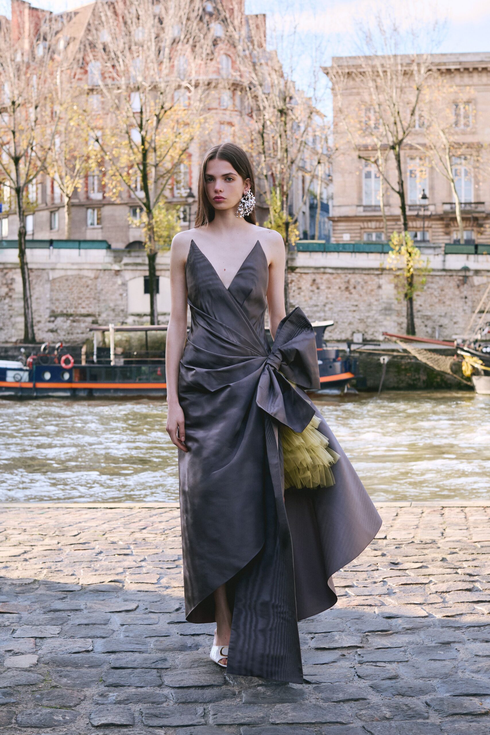 gray silk sleeveless v-neck fitted draped tiered gown