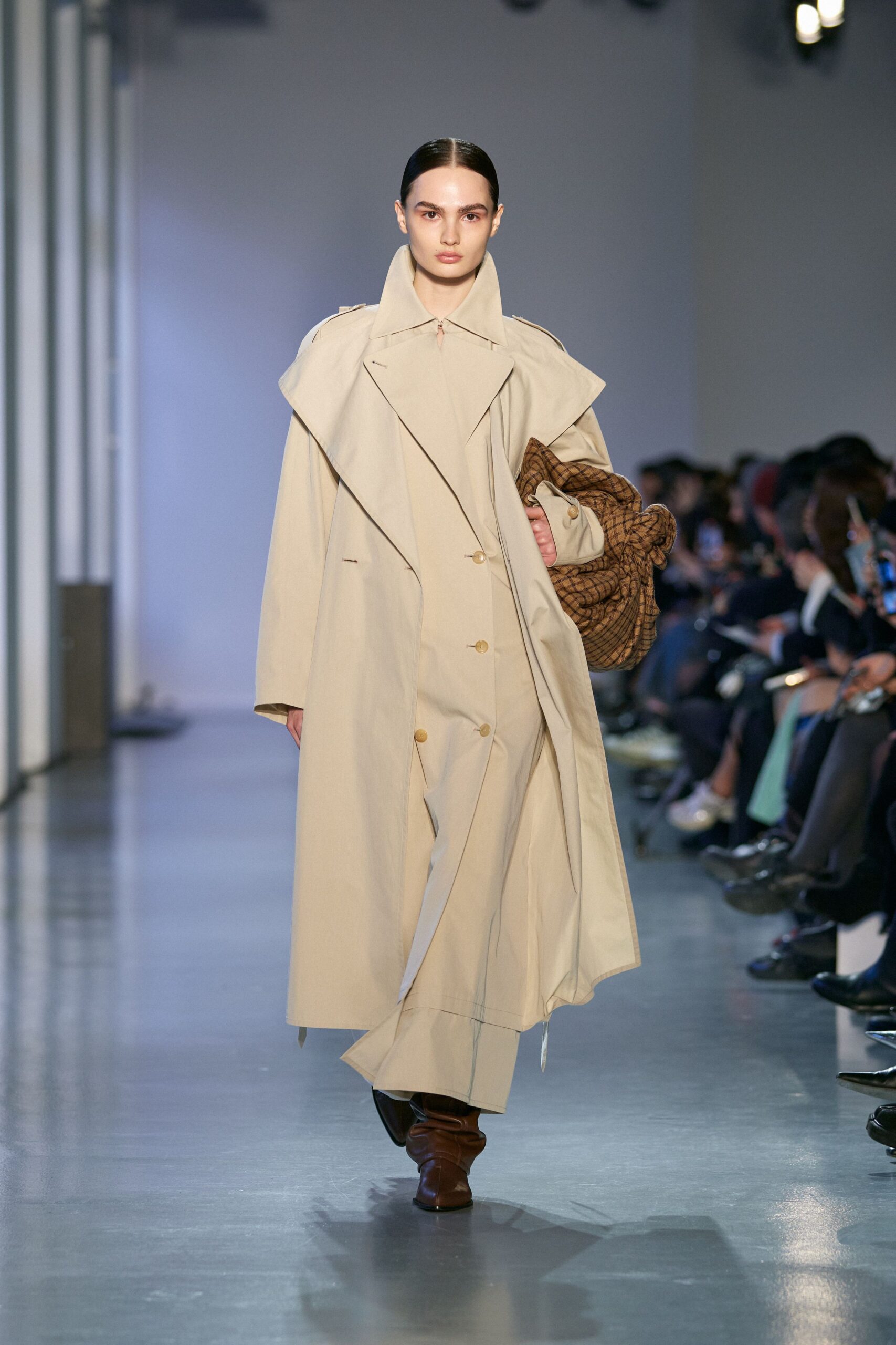beige coat and brown boots