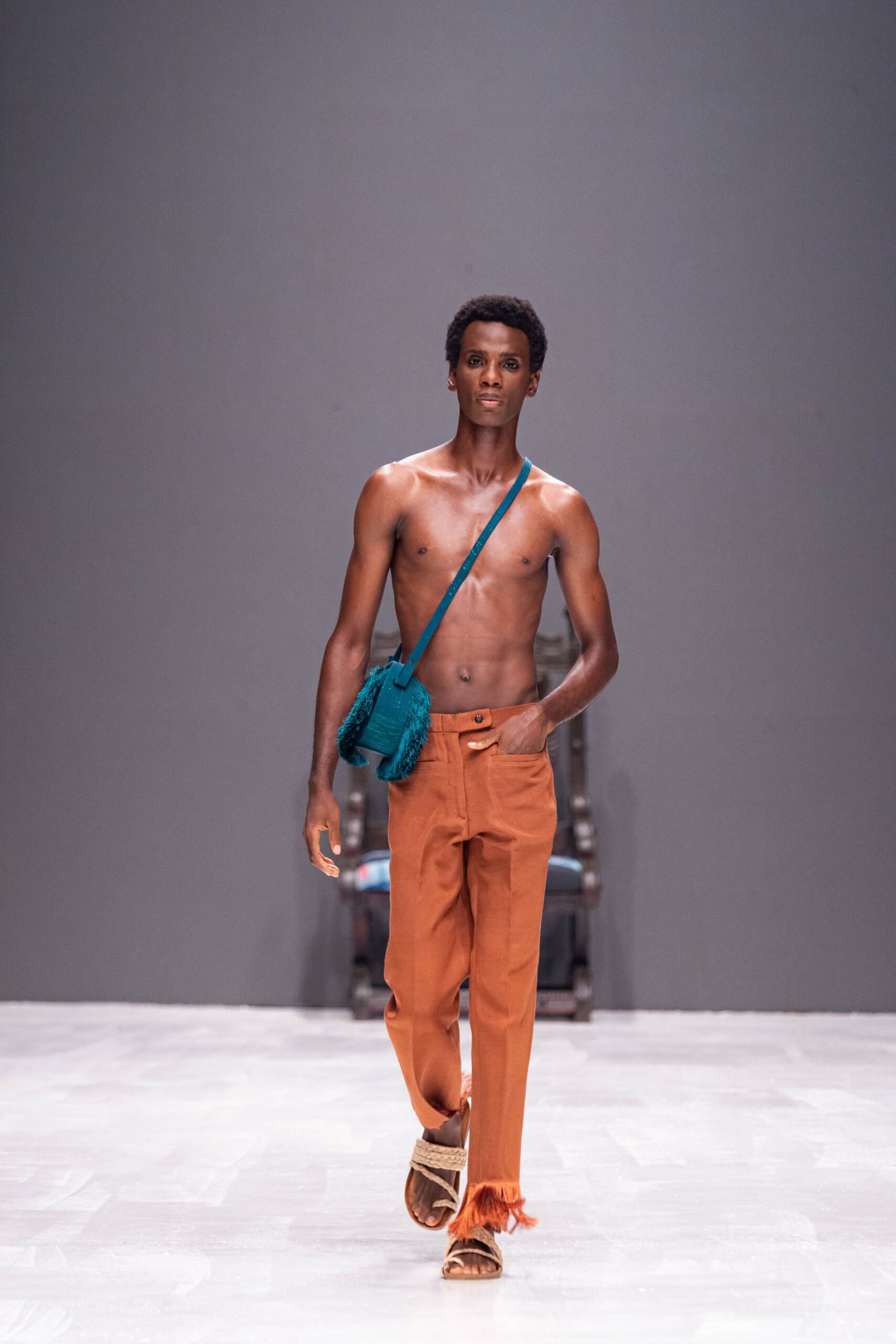 orange relaxed pants with fringed detail