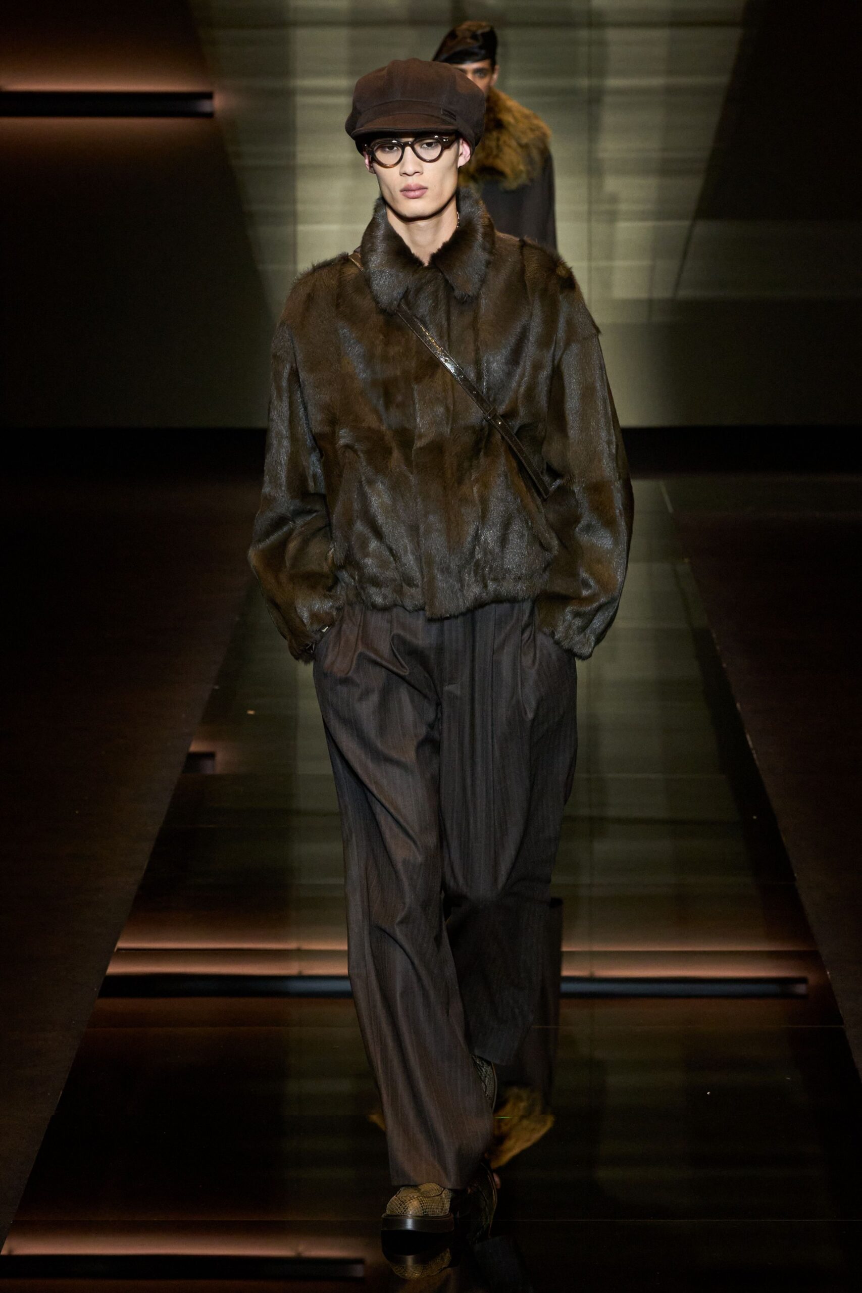 brown faux-fur jacket with gray pants