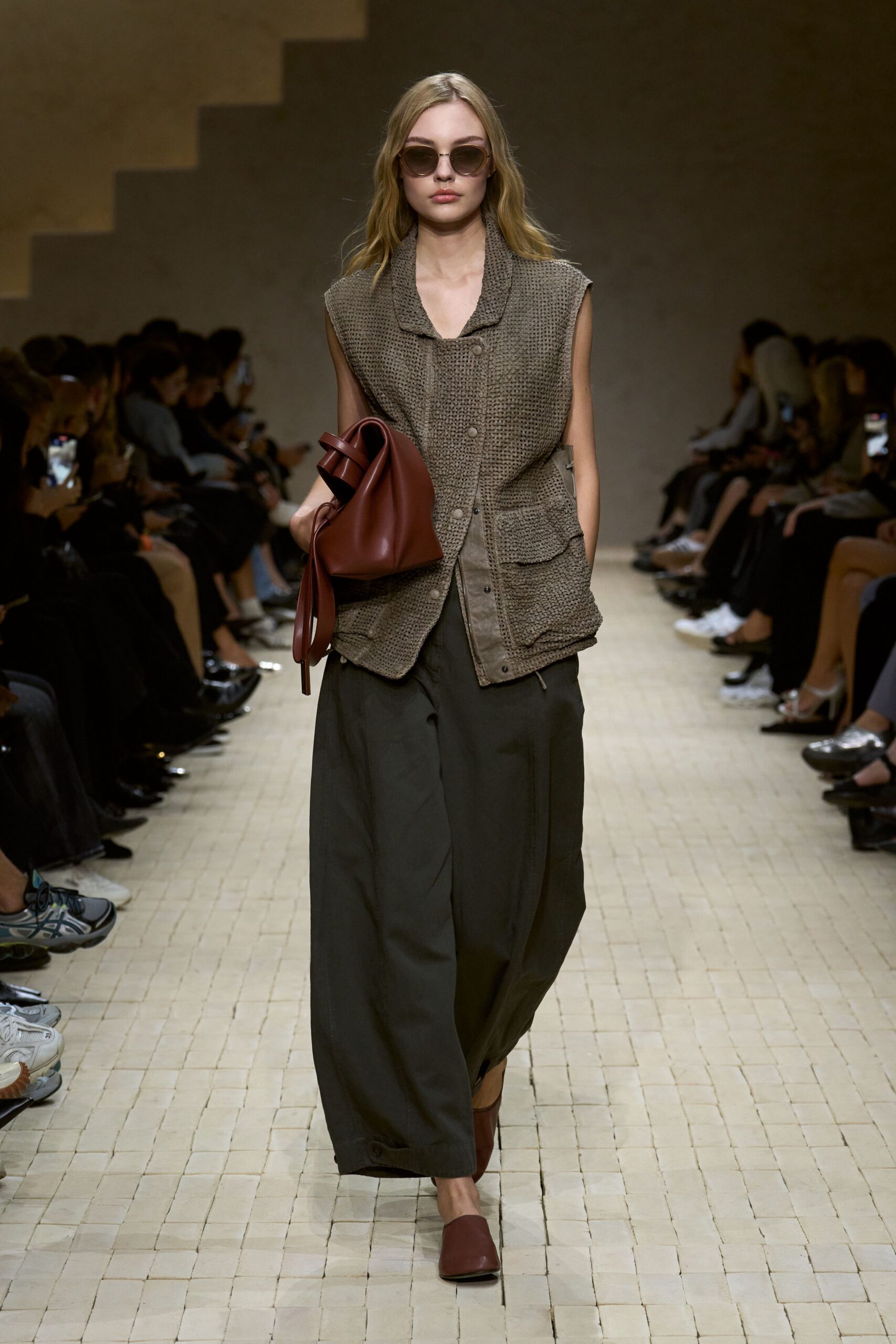 brown cotton vest with green pants