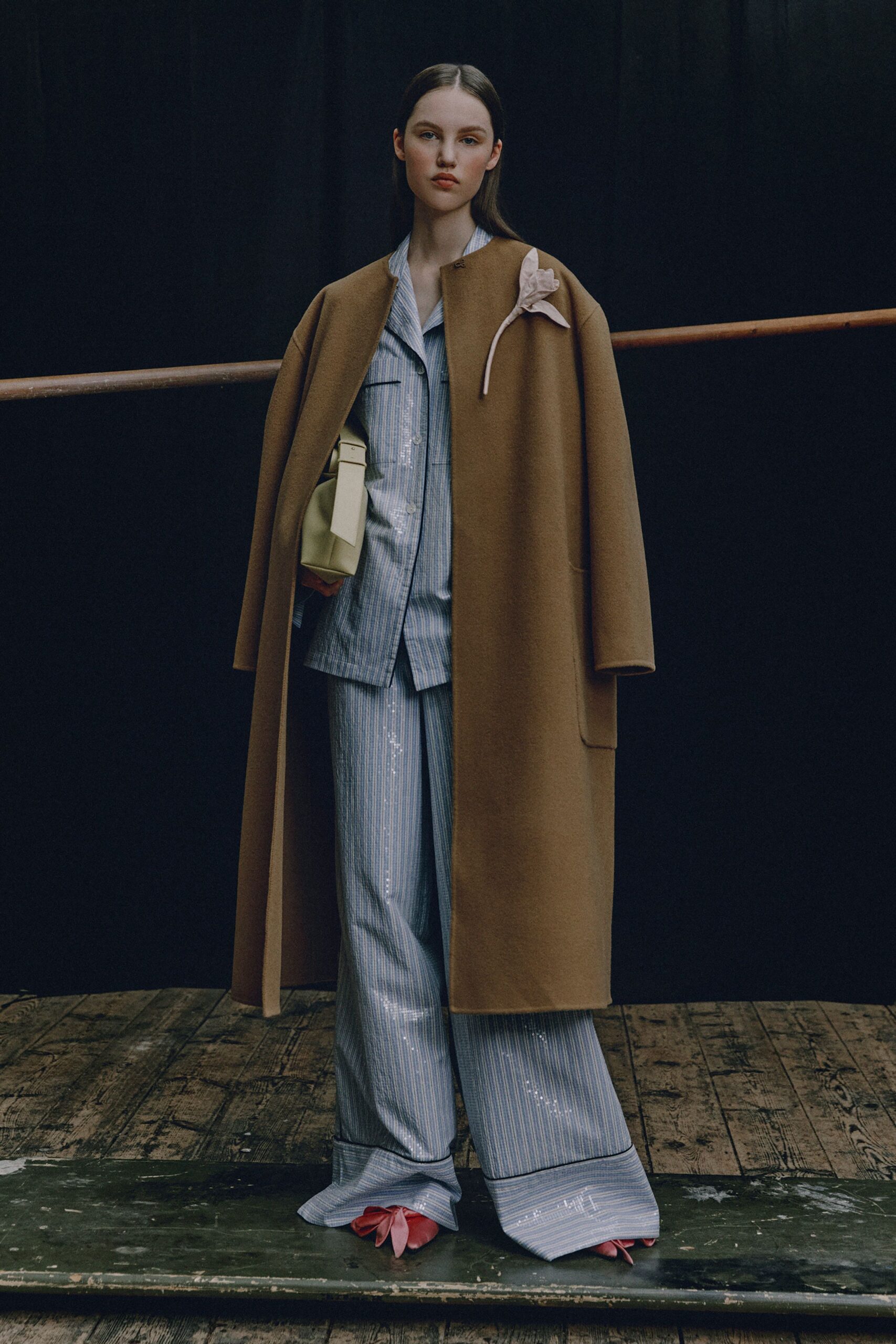 brown oversized coat with blue striped shirt