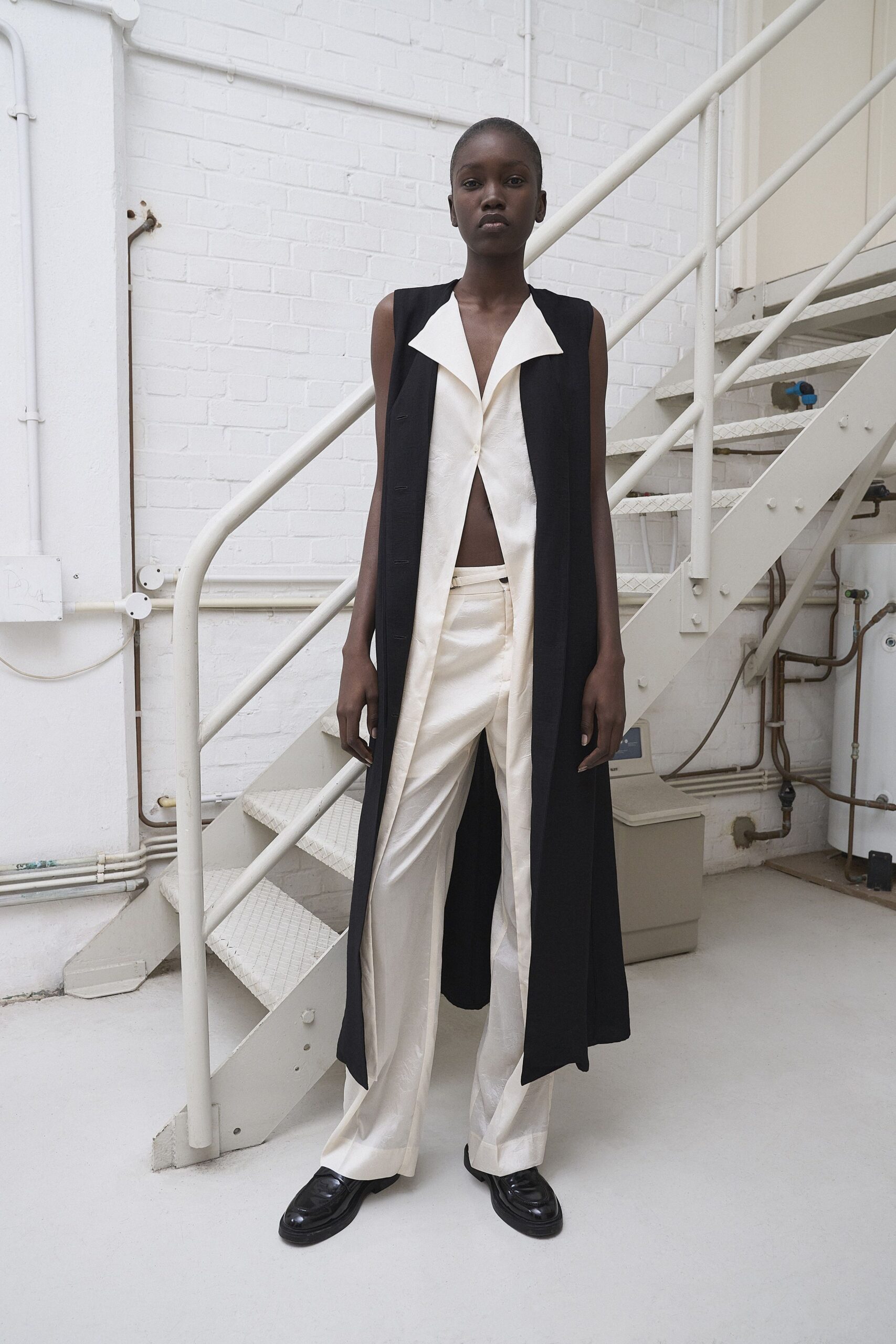 black silk long-sleeve collared fitted layered vest