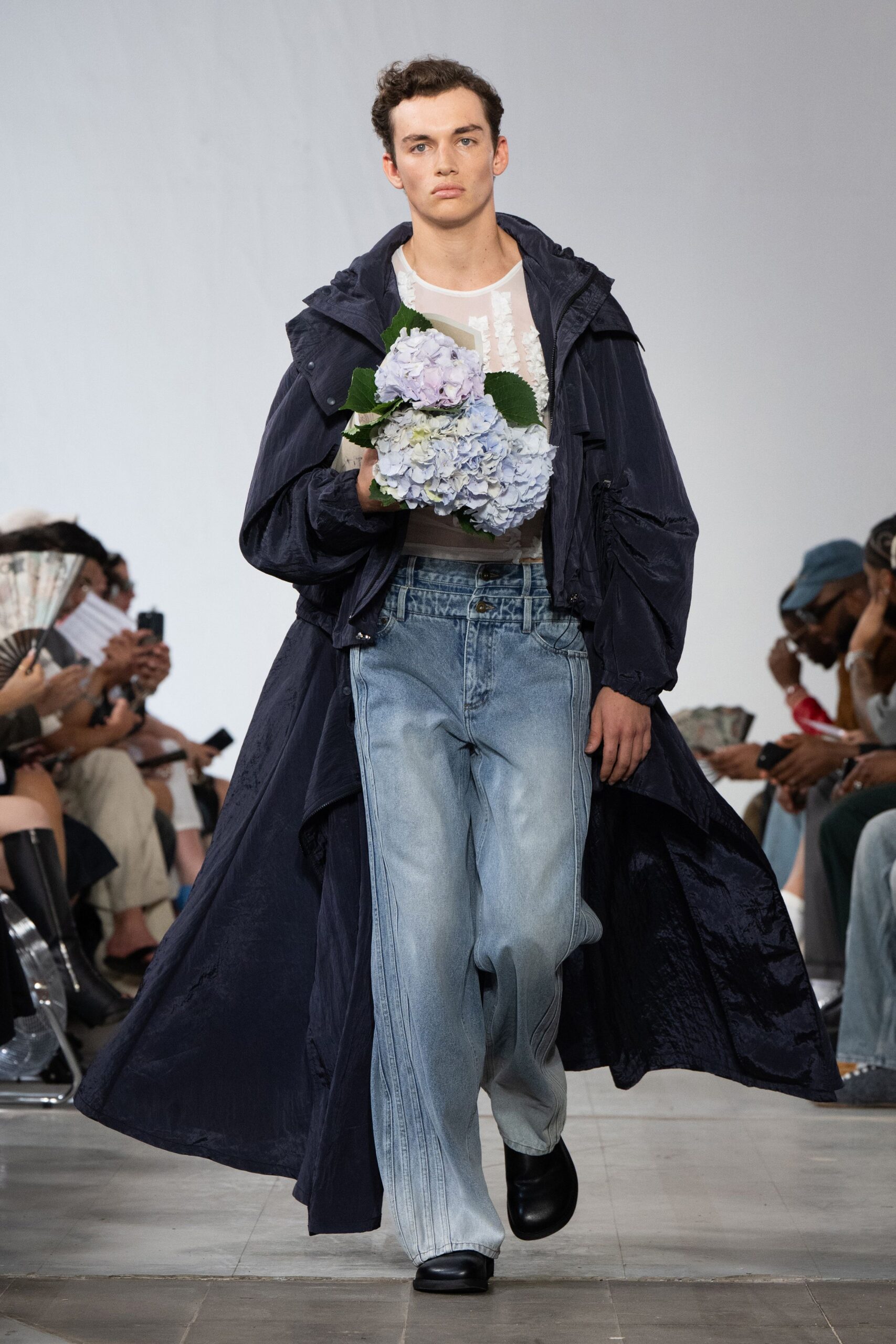 navy coat white shirt light blue pants