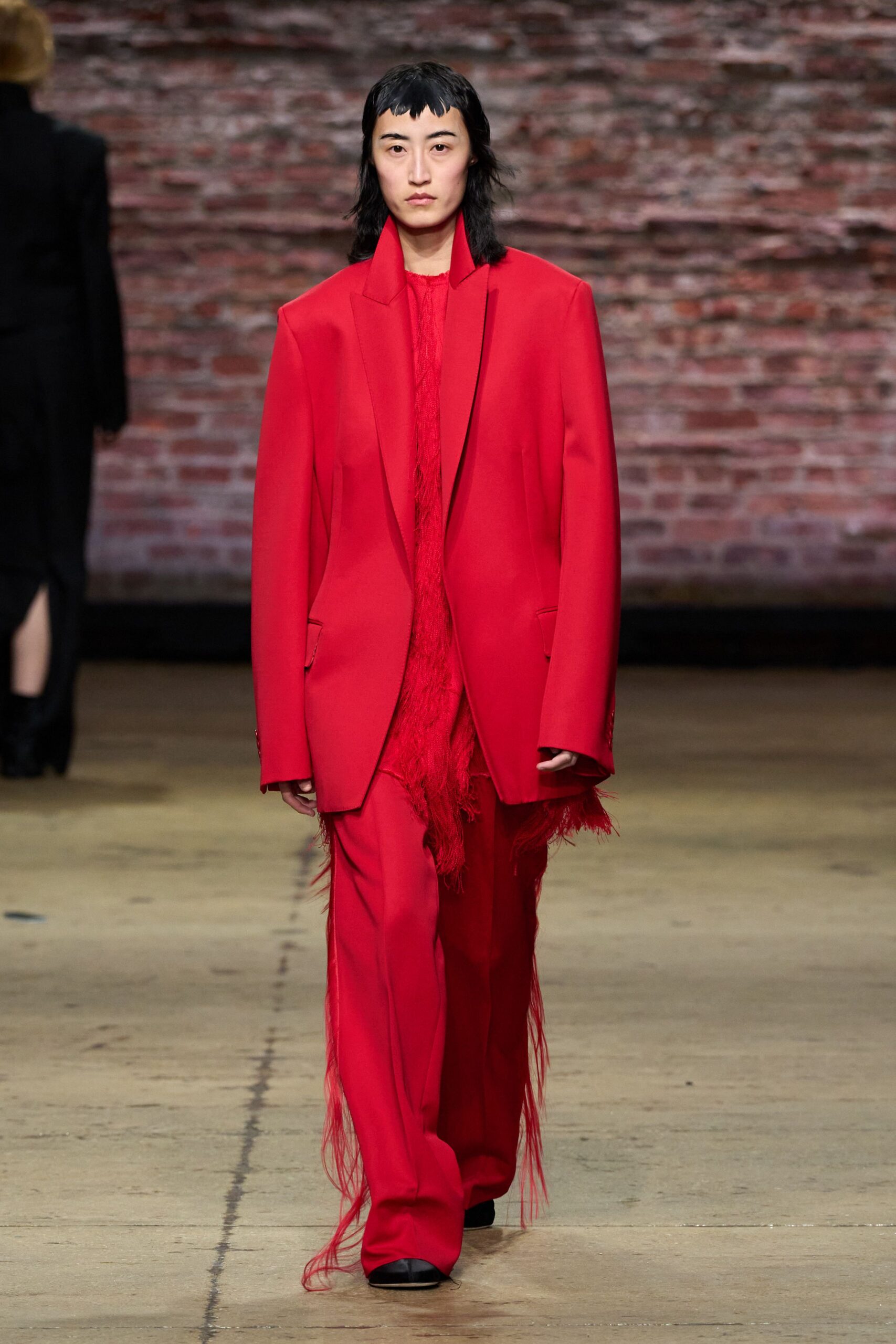 red fitted fringed suit