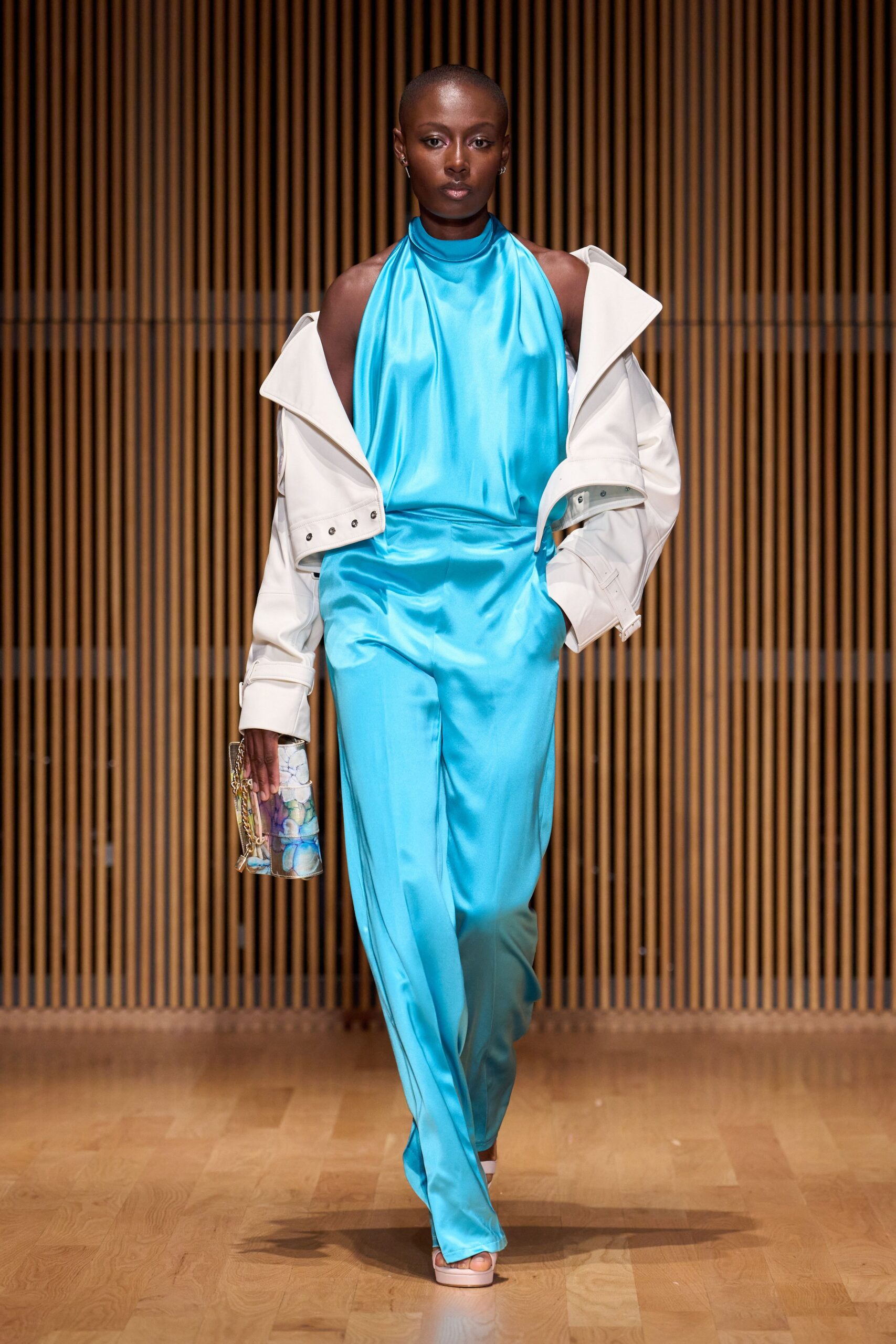 white jacket blue jumpsuit