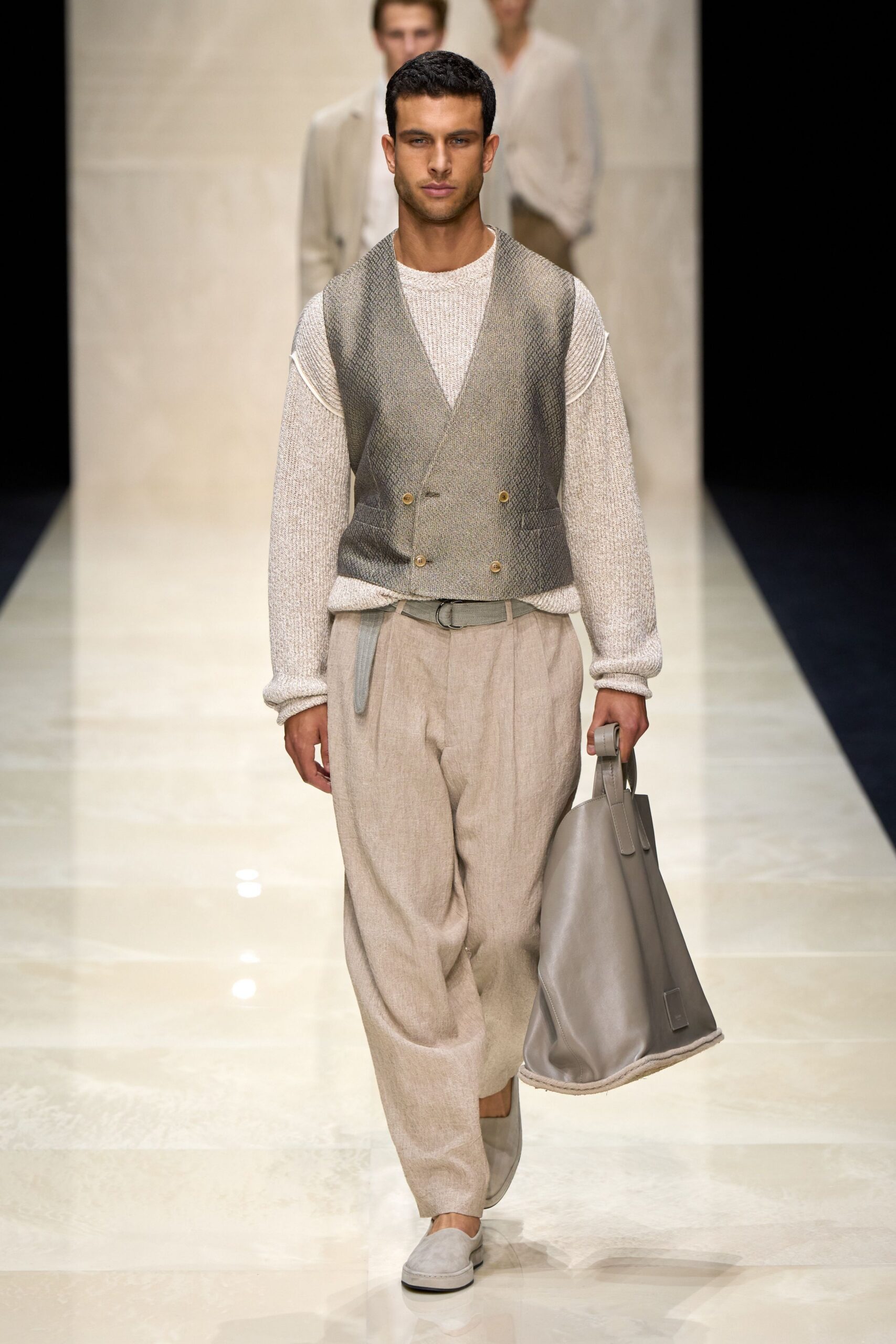 gray vest white shirt beige pants