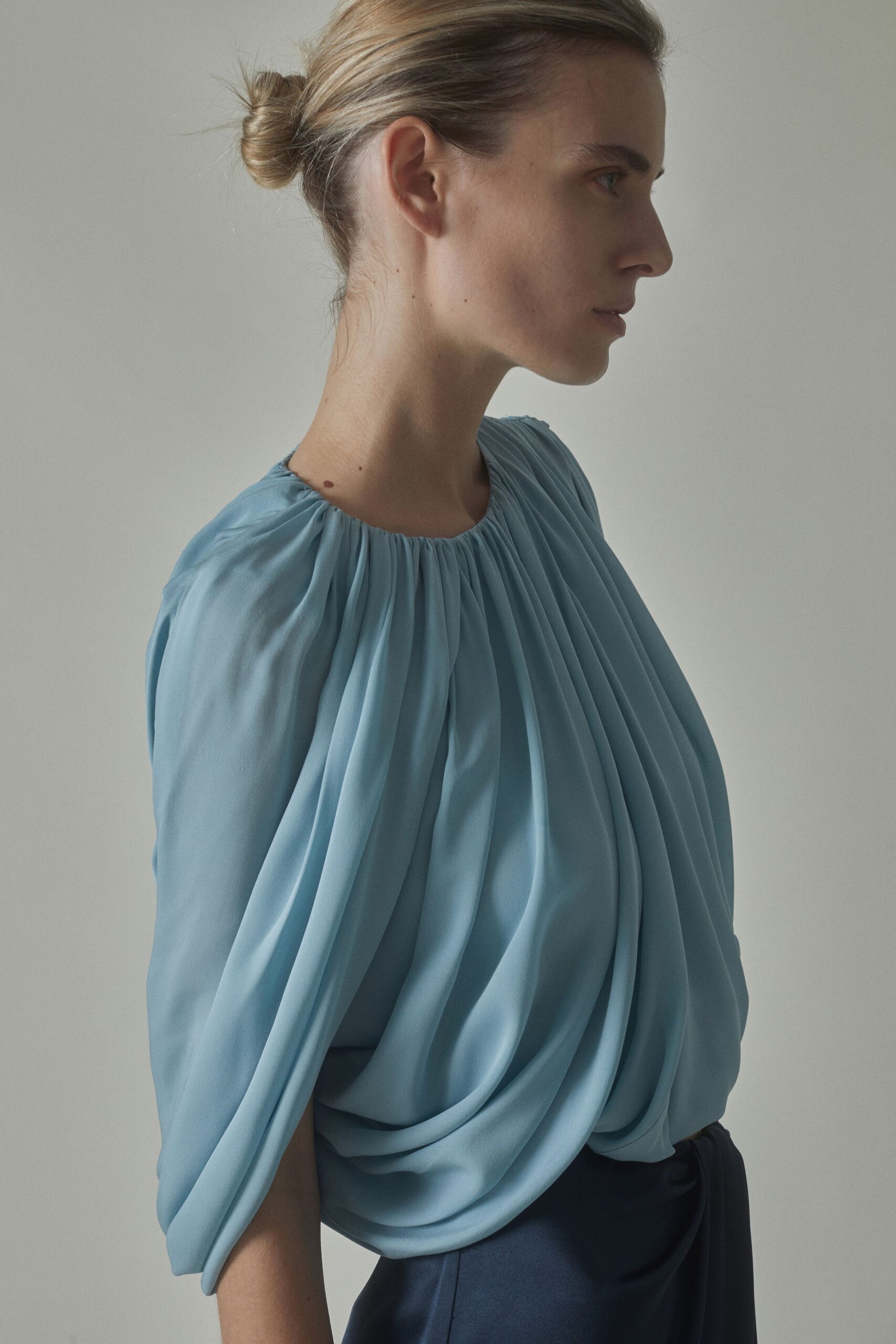 blue pleated chiffon blouse