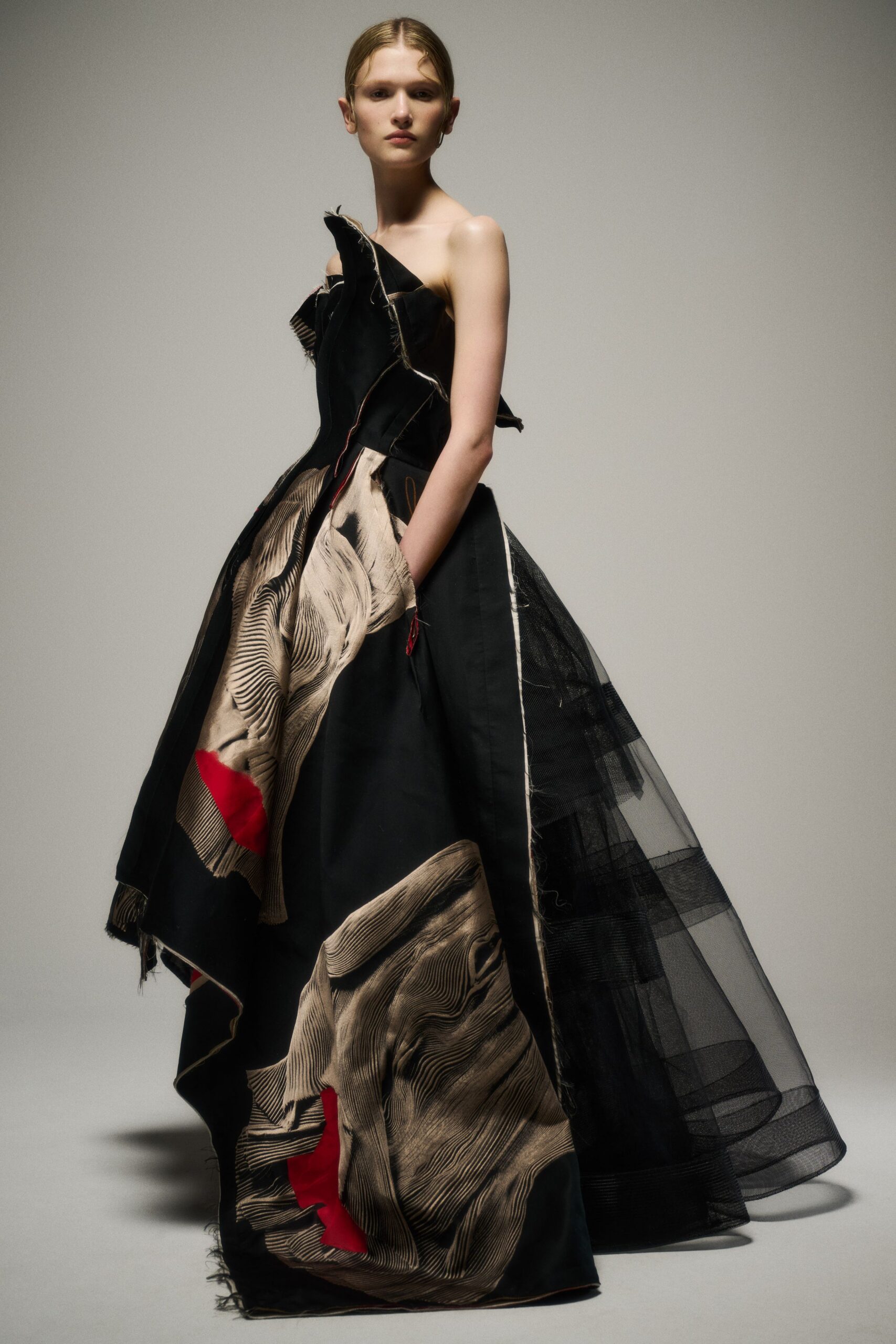 black and beige ruffled gown