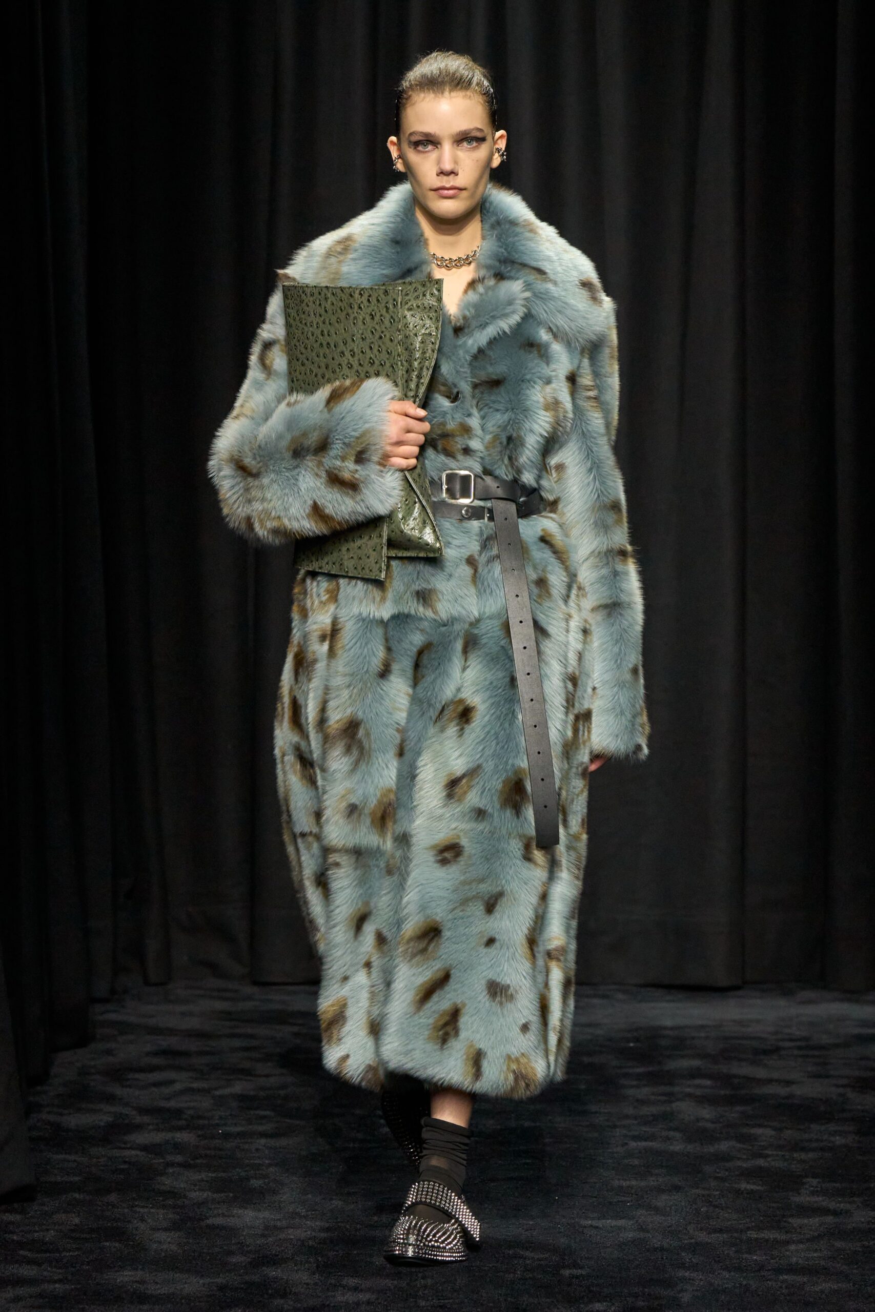 blue fur coat with green dress