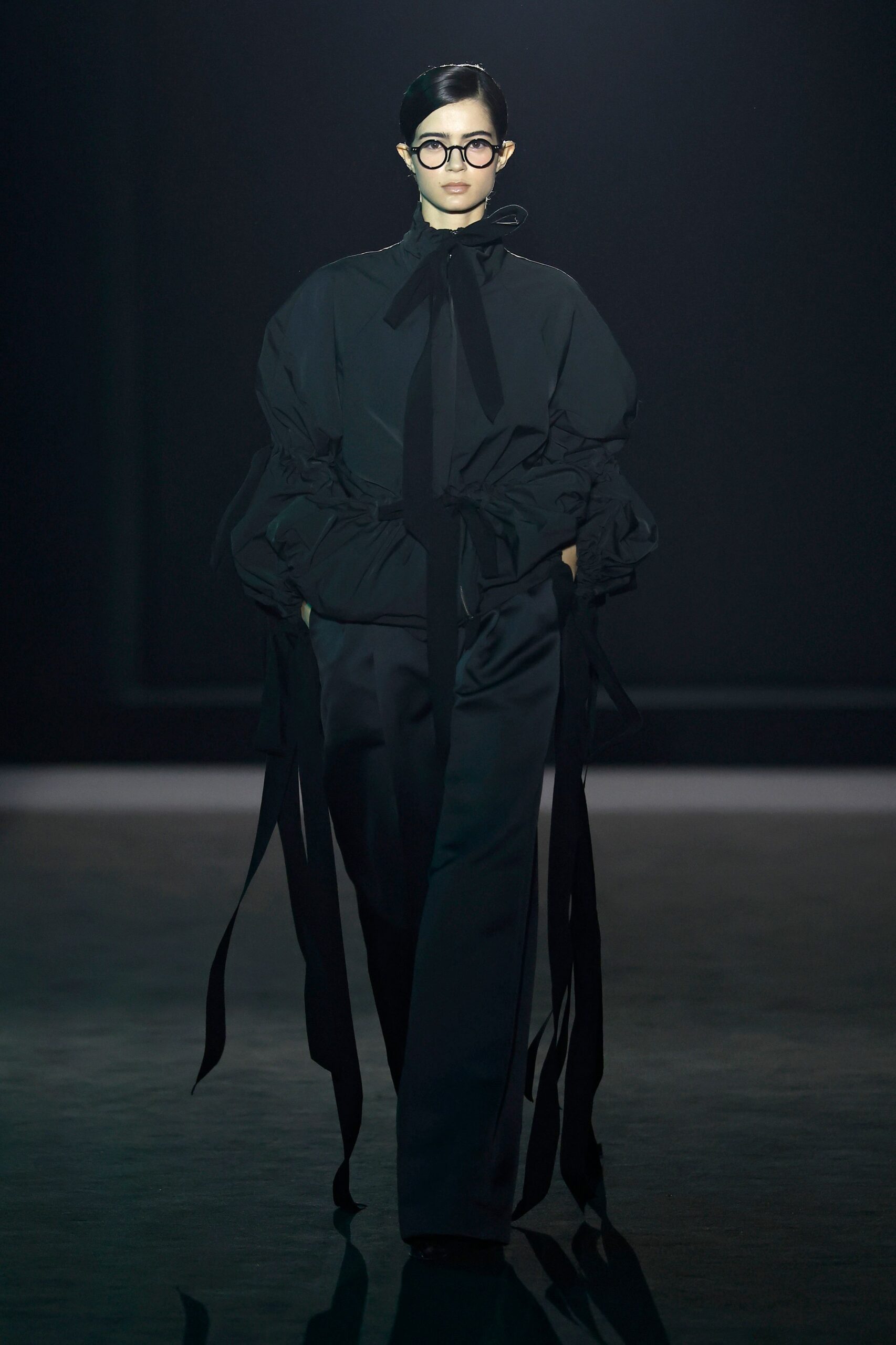 black silk relaxed top and fitted pants