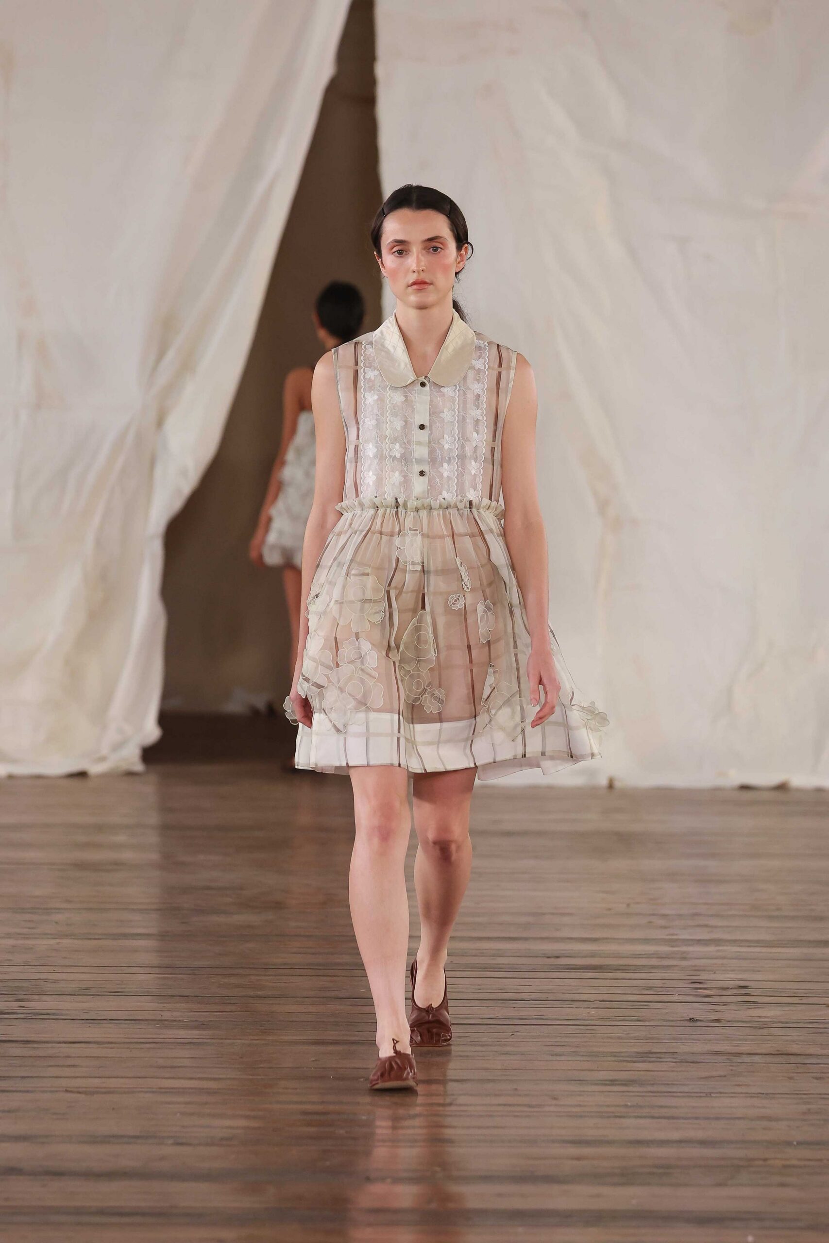 white pleated mini dress with brown shoes