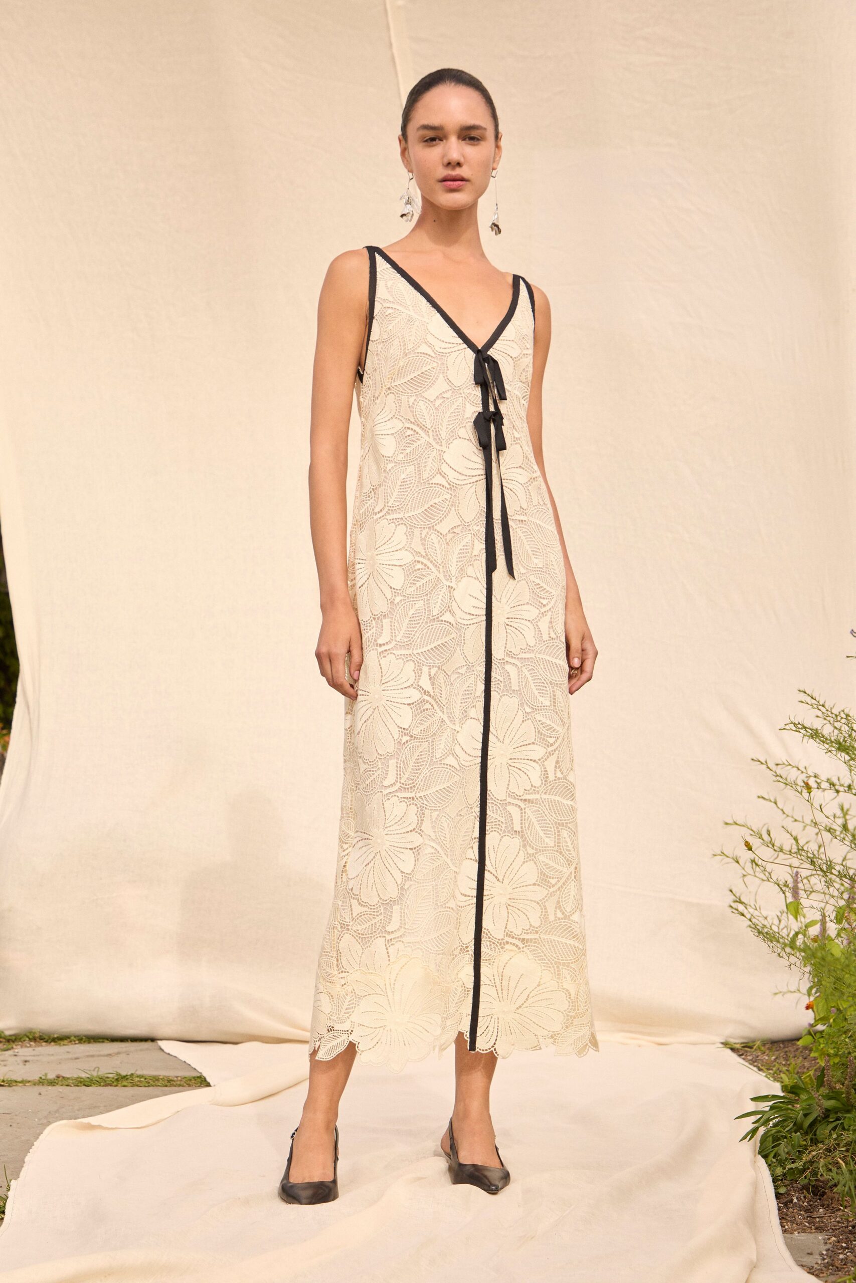ivory floral midi dress with black shoes