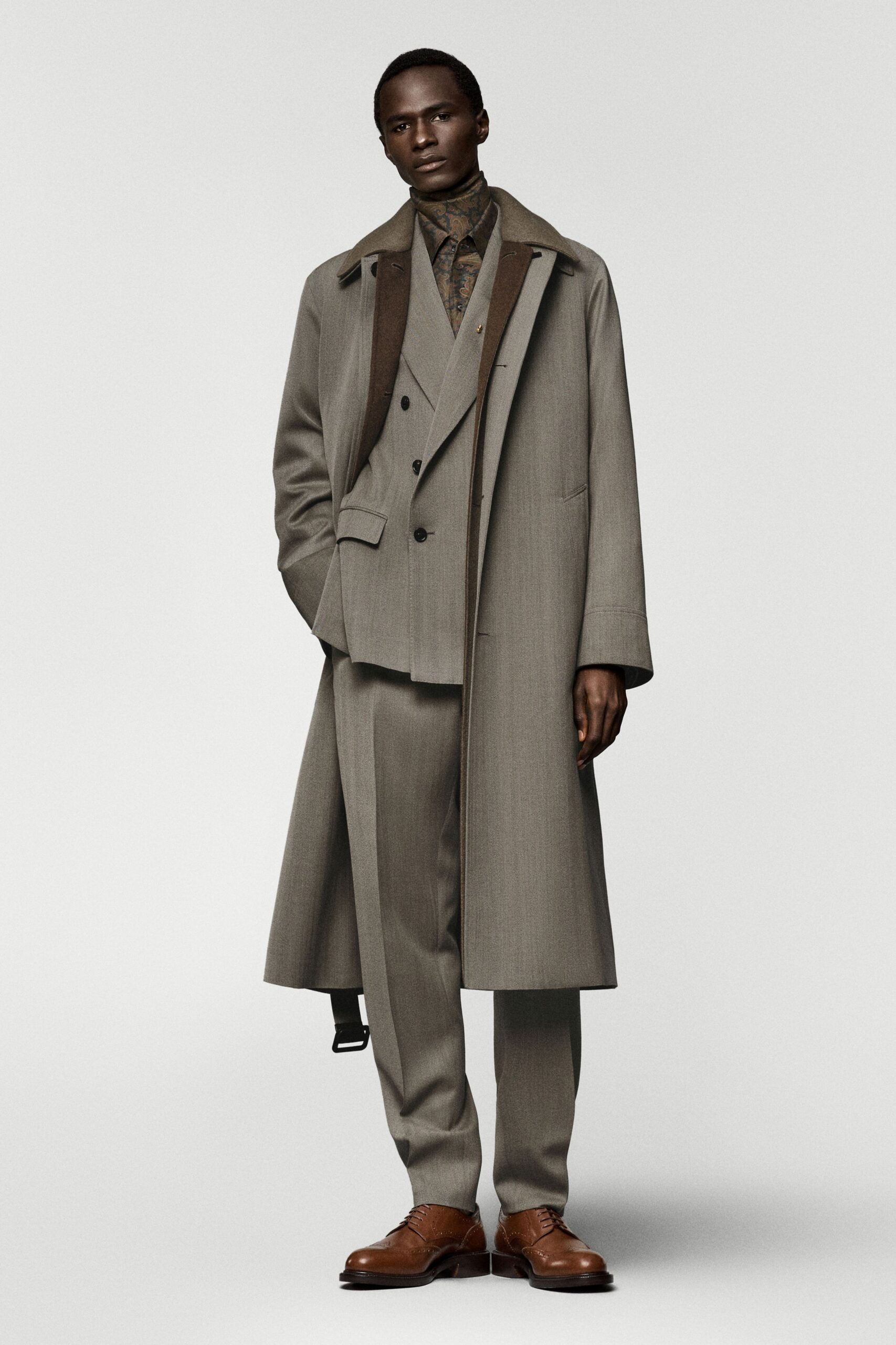 gray tailored coat and suit
