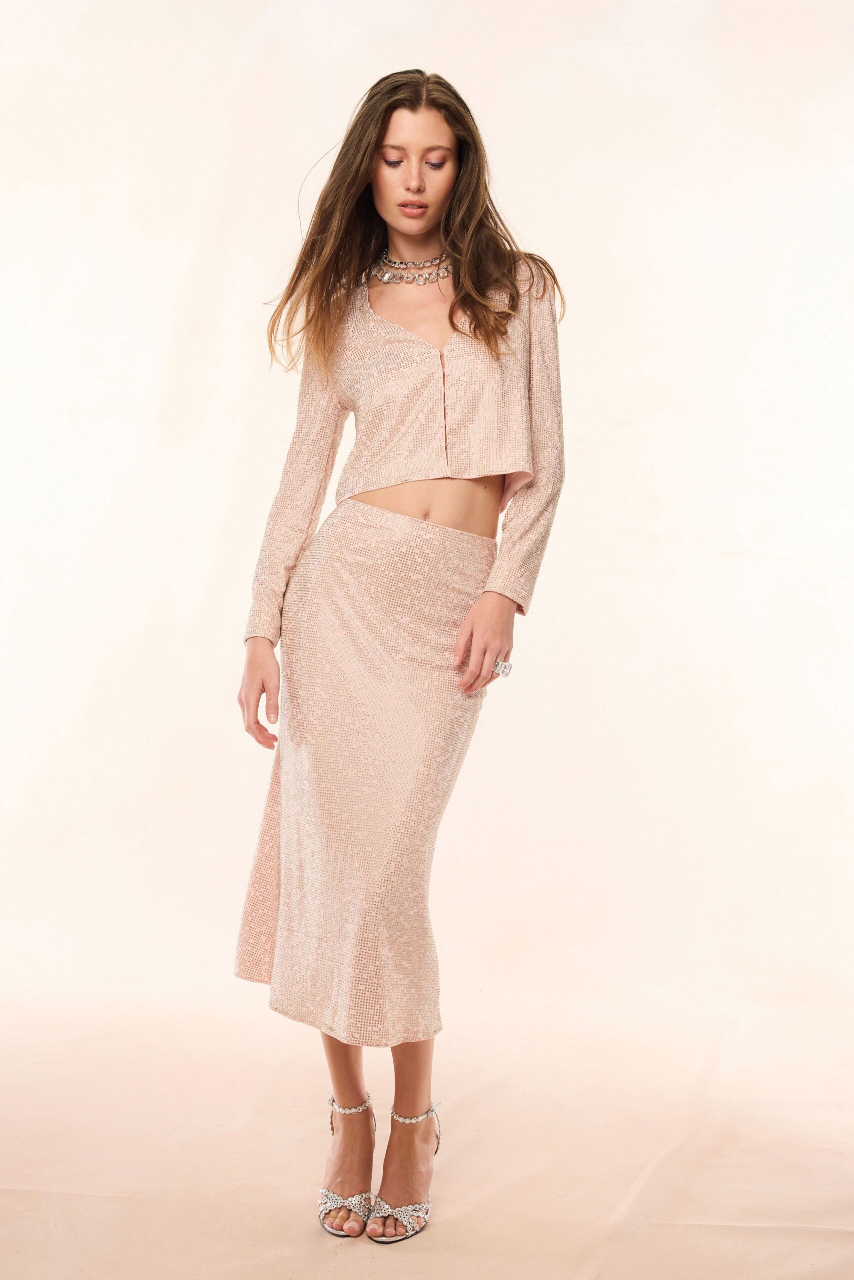 pink silk long-sleeve v-neck fitted draped shiny top