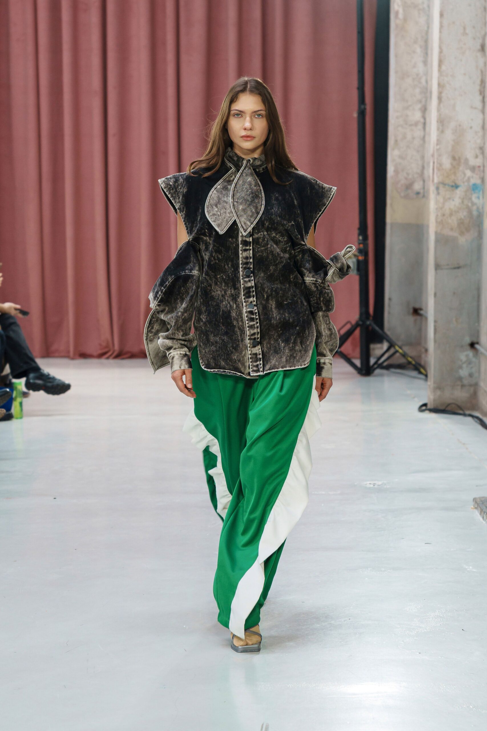 black ruffled shirt green flared pants