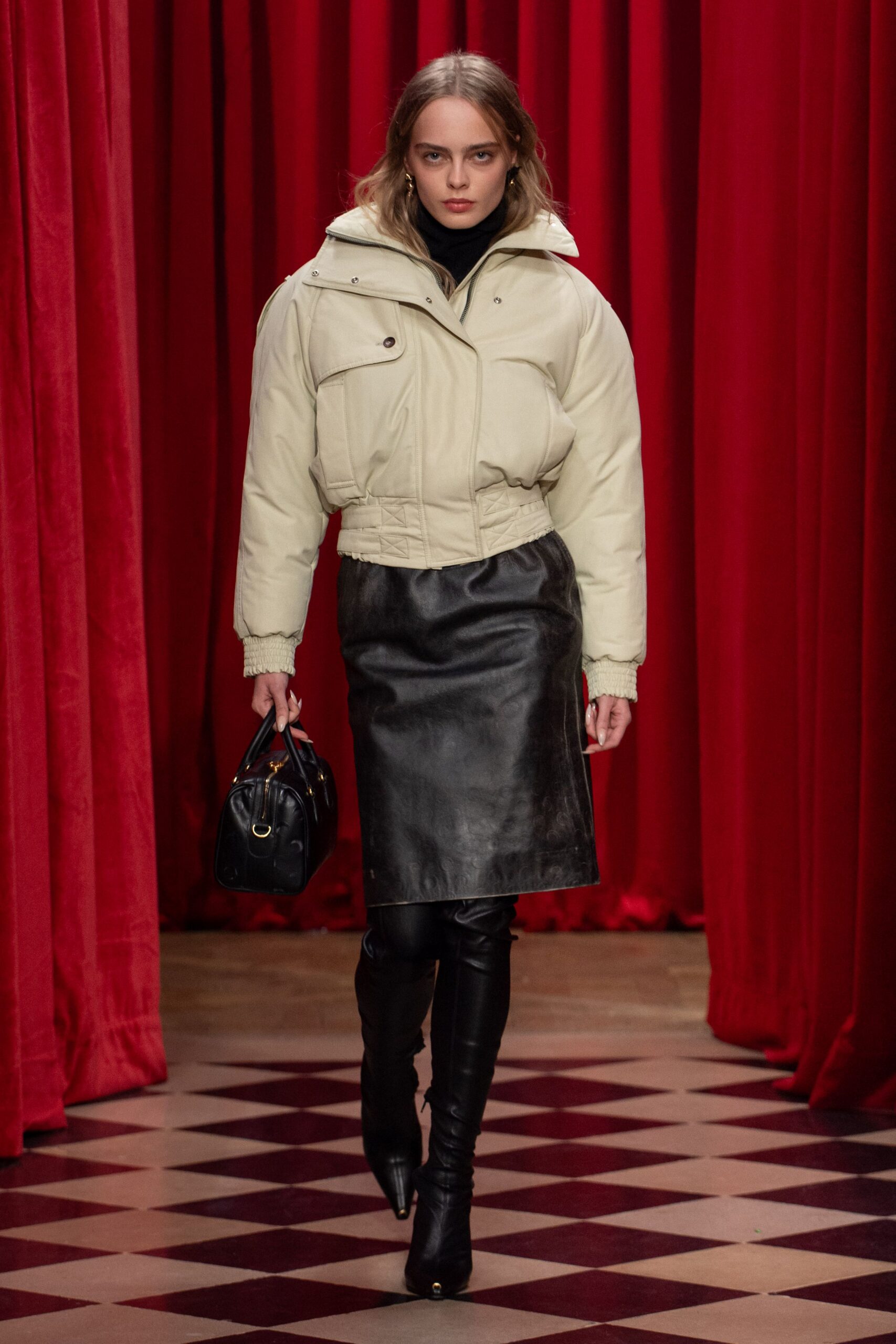 white relaxed jacket black leather skirt