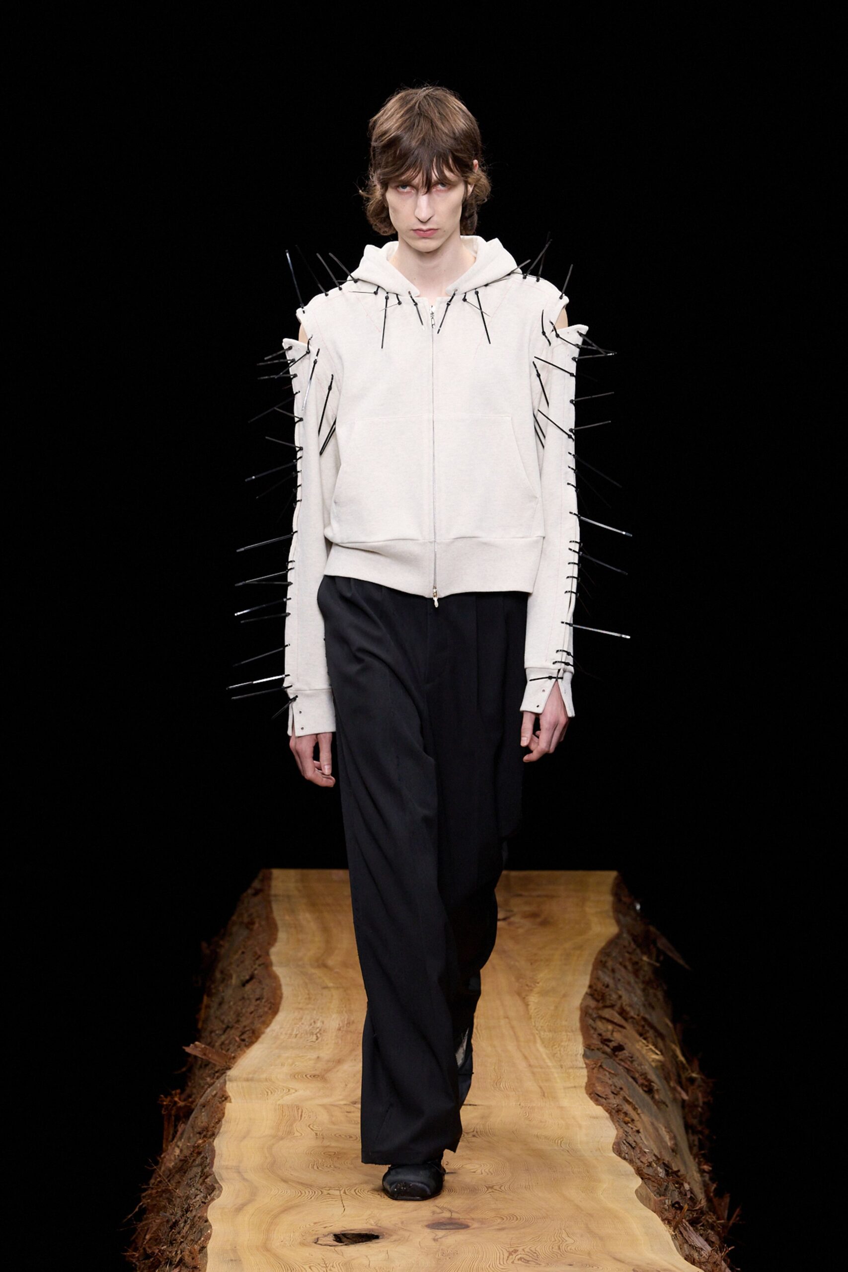 white spiked hoodie with black pants