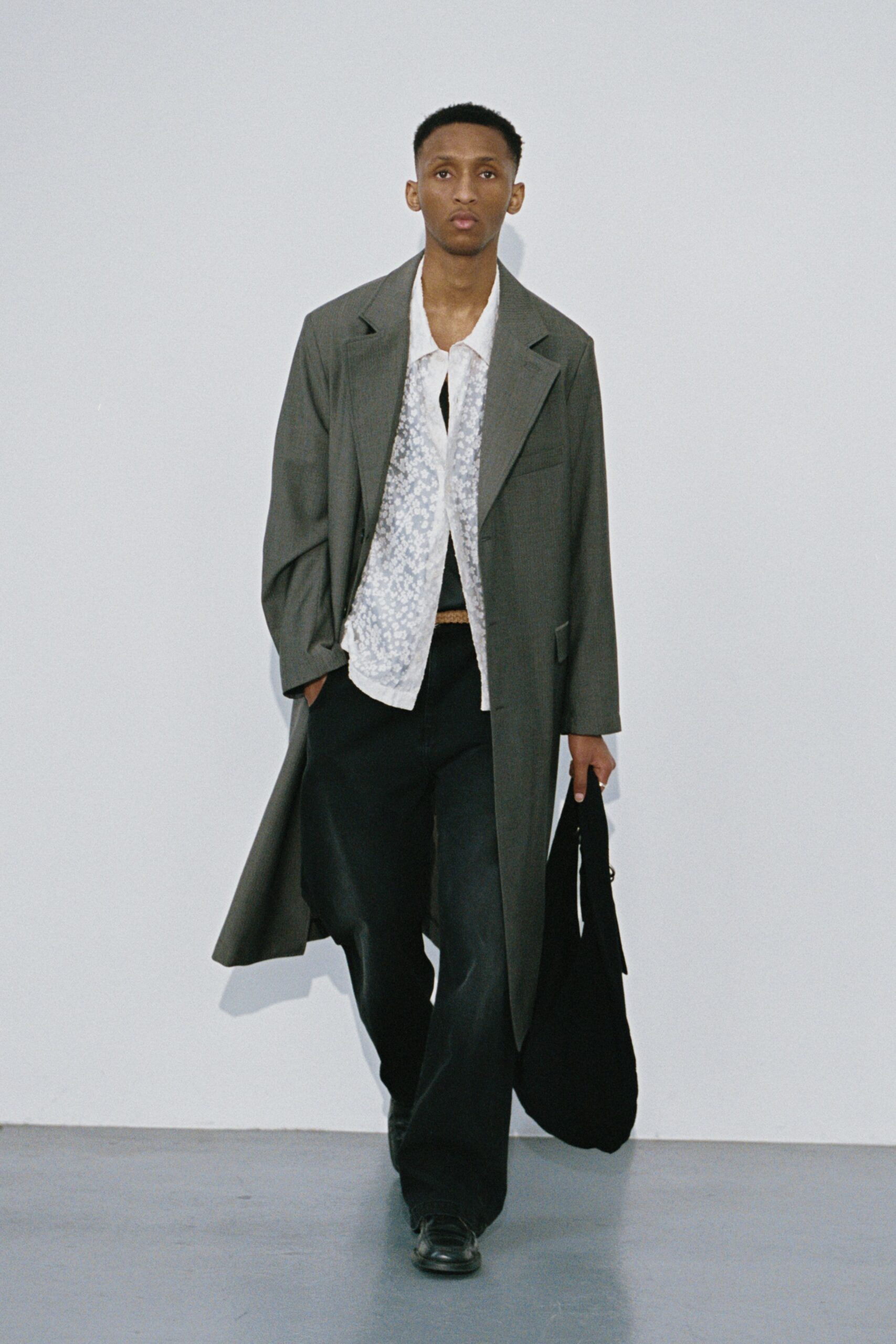 gray wool coat with black pants