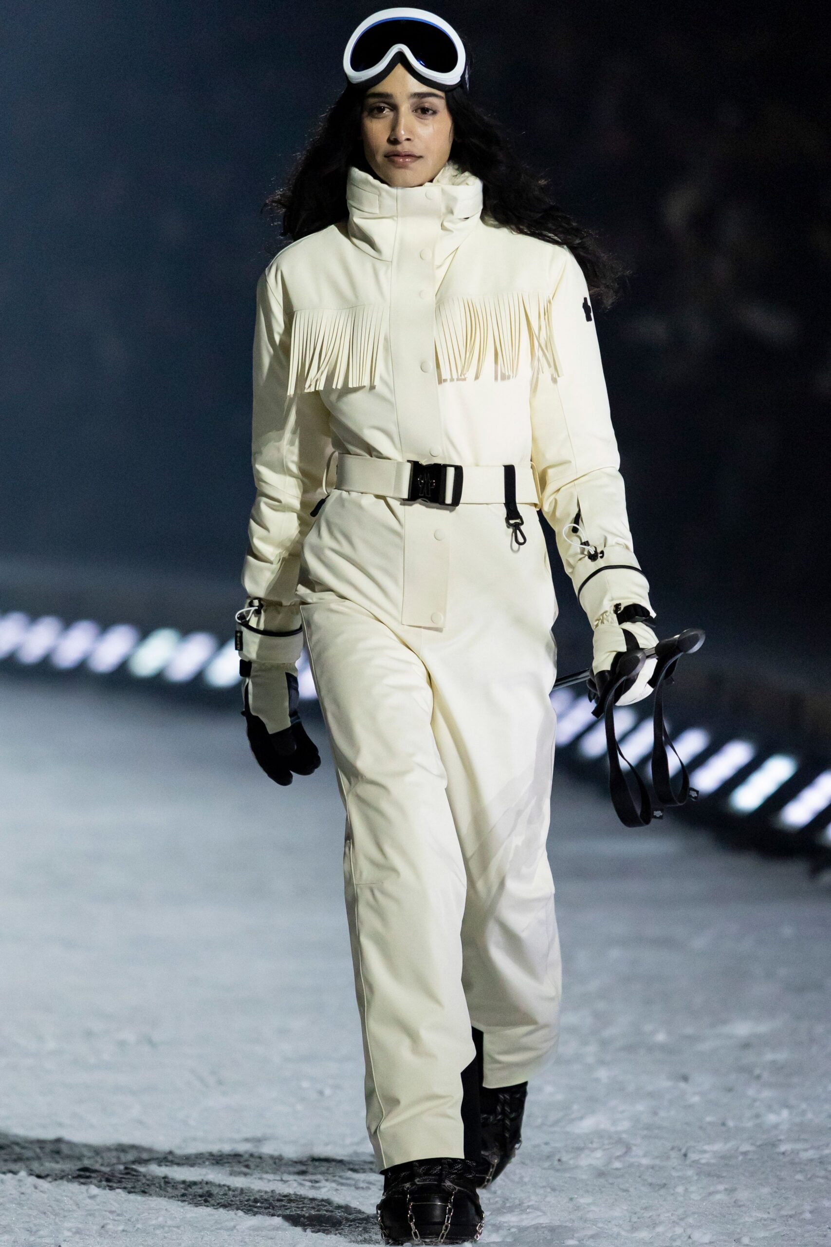 white fitted jumpsuit with fringes