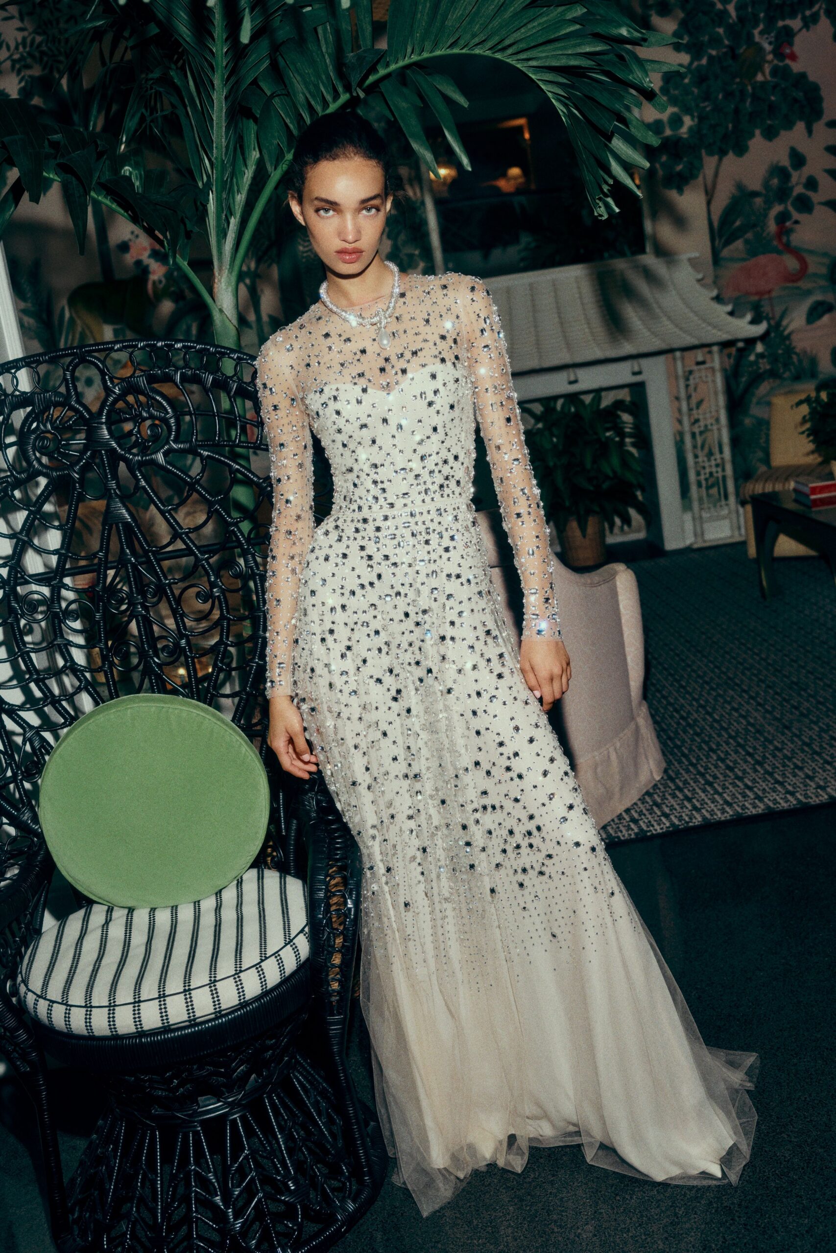 white beaded long-sleeve gown