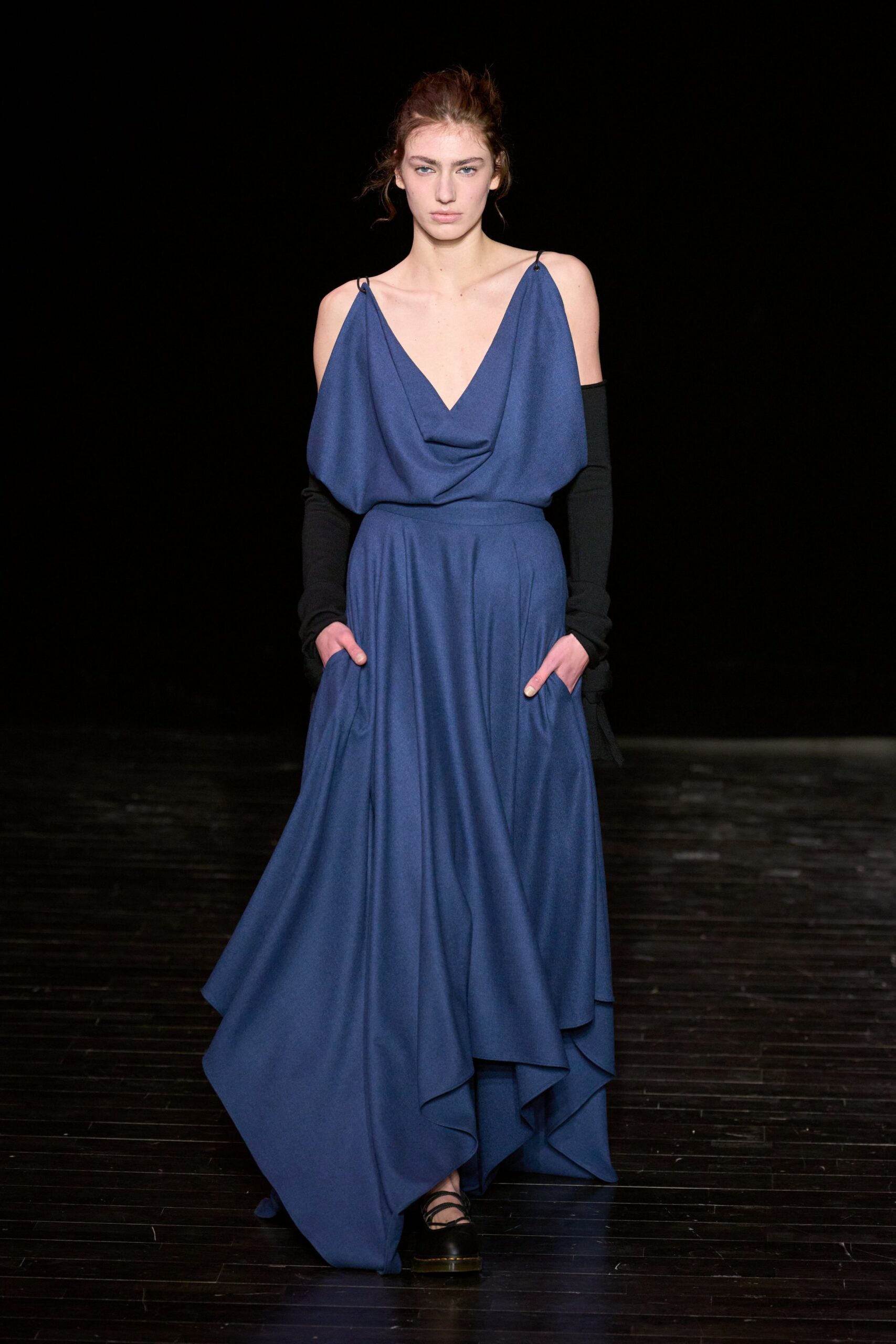blue silk draped gown with black top