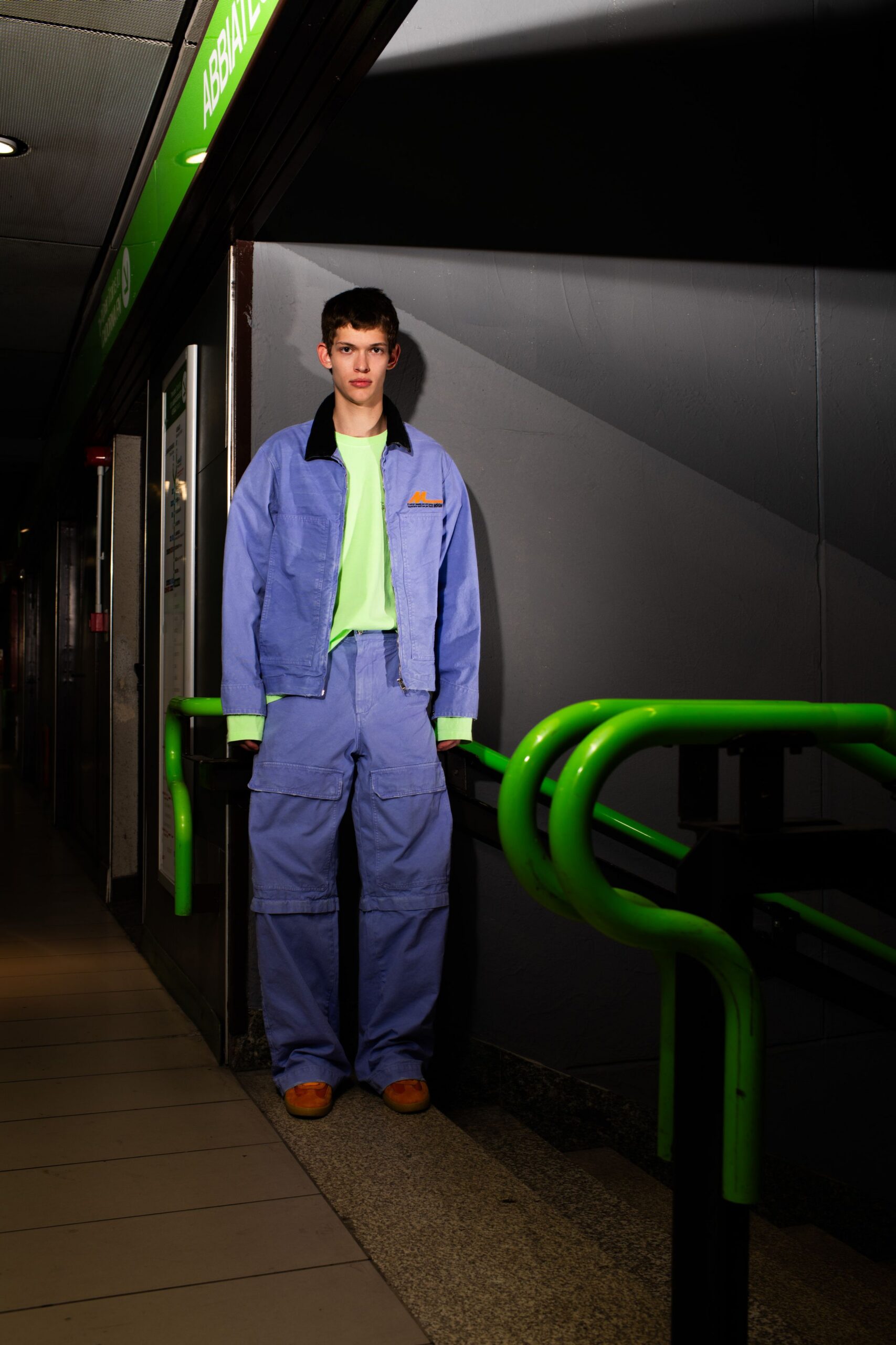 blue relaxed jacket with green t-shirt