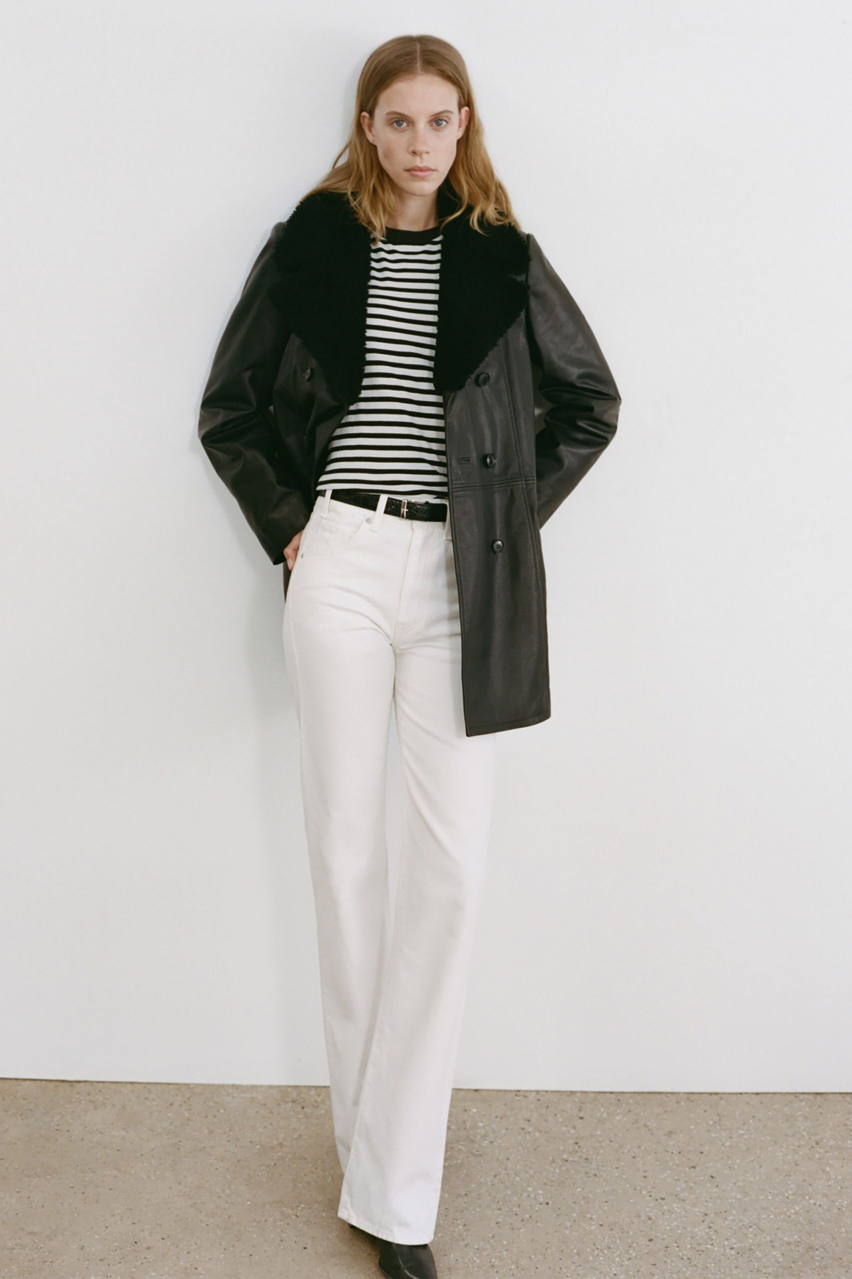 black leather long-sleeve double-breasted structured padded coat