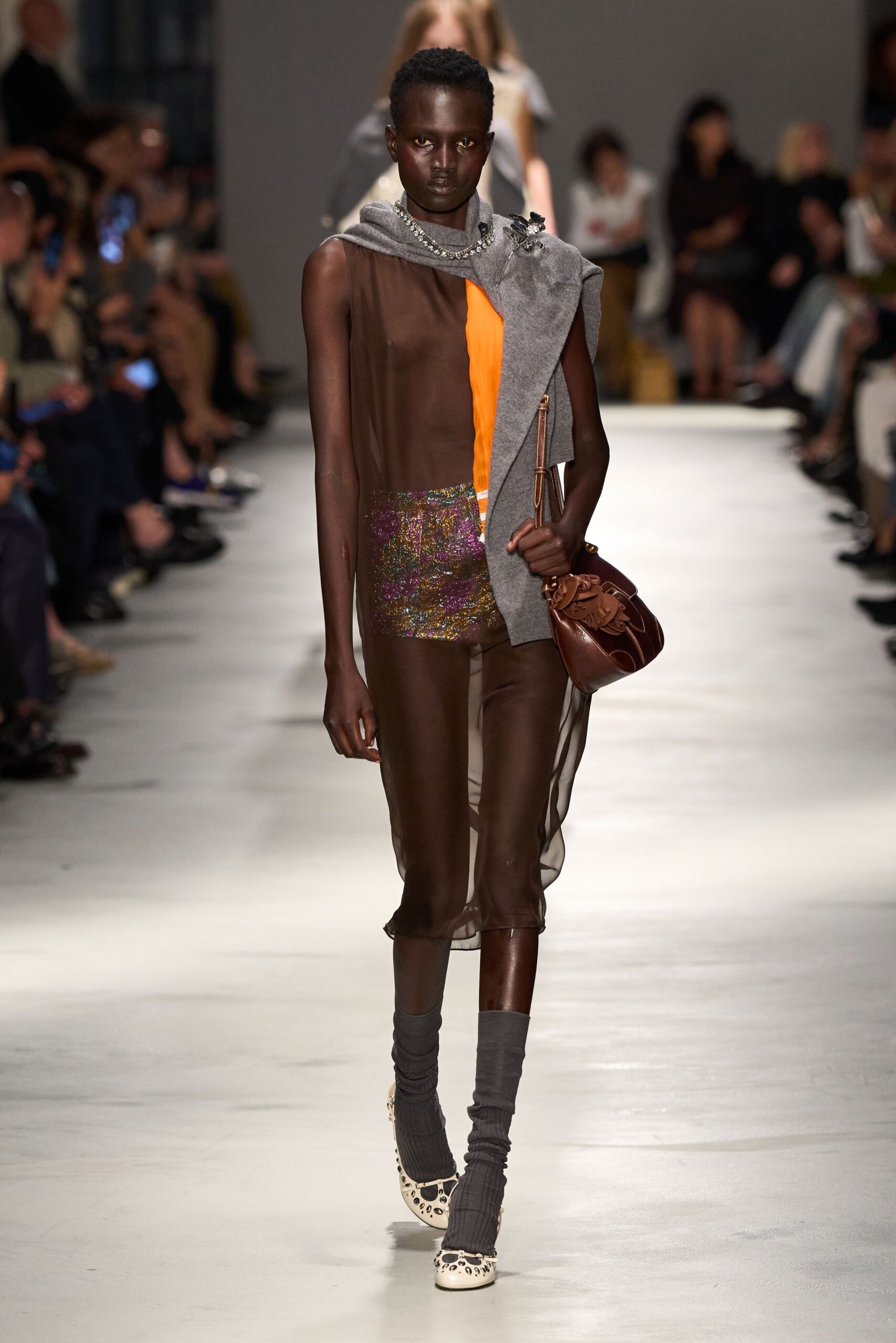 brown silk jumpsuit with gray sweater
