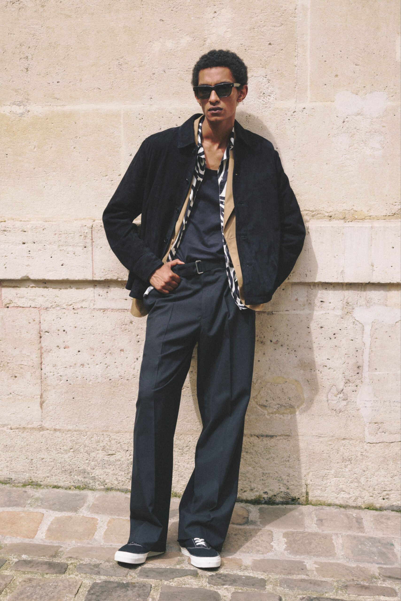 black suede jacket with printed shirt