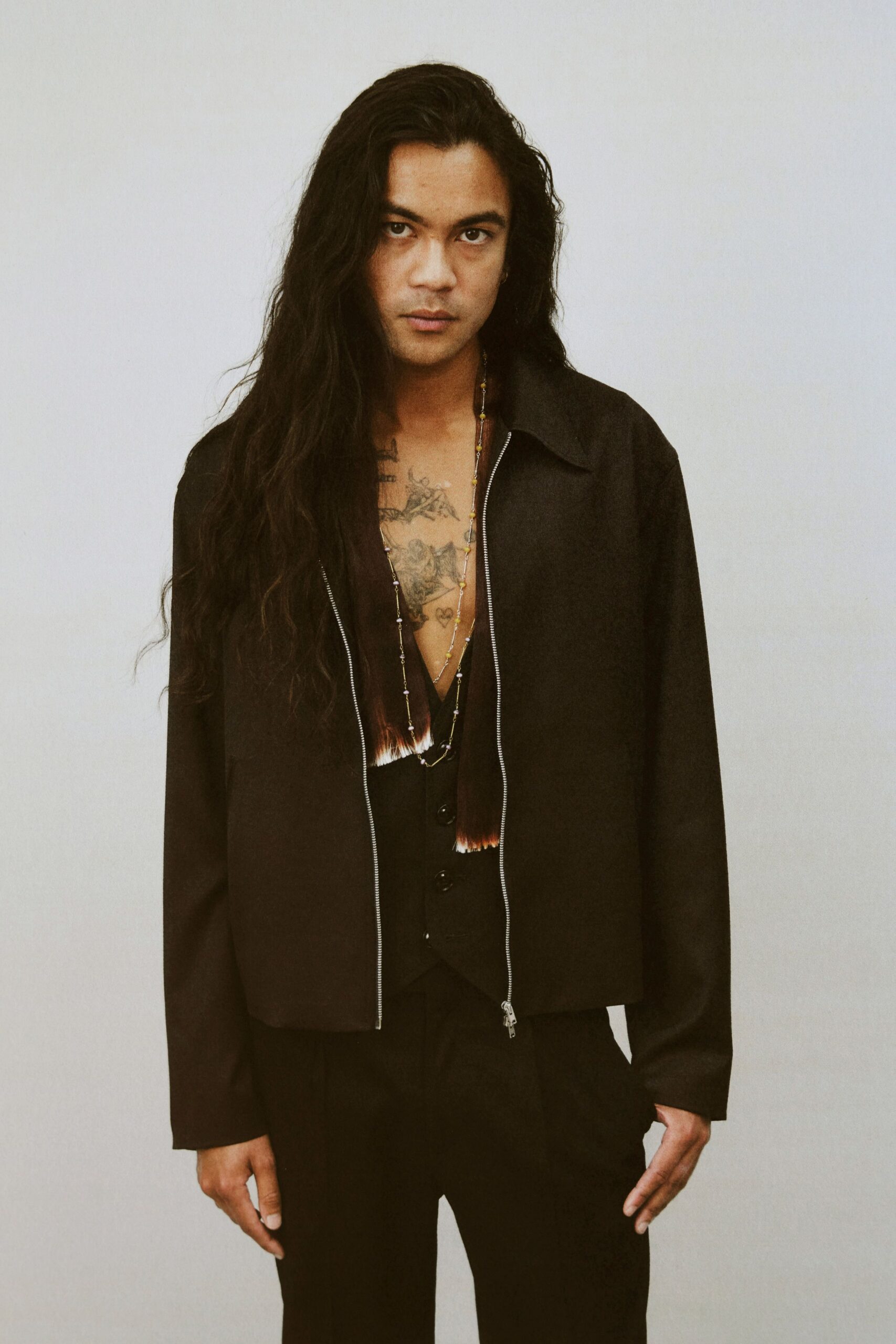 black jacket and vest outfit