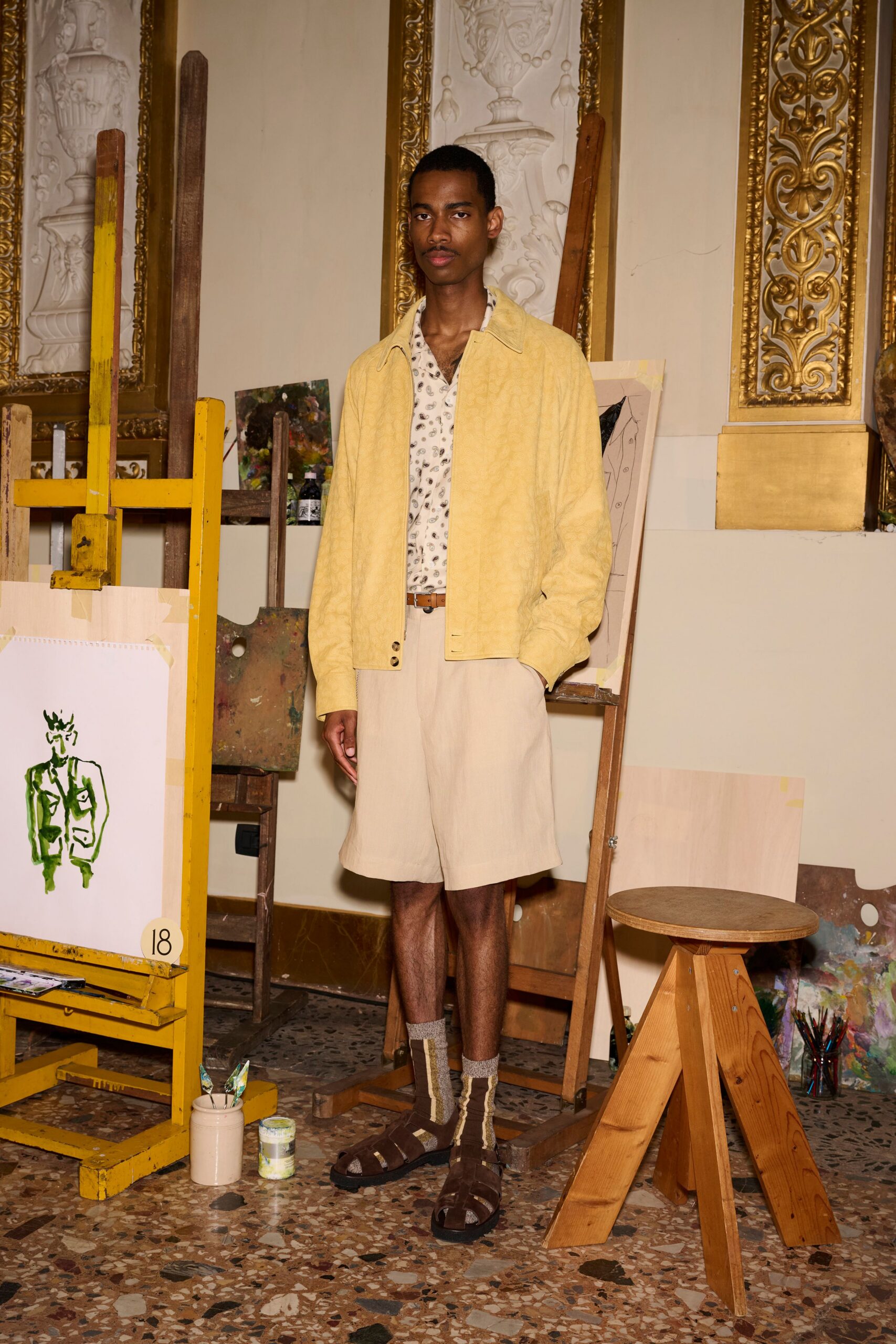 relaxed floral shirt with beige shorts