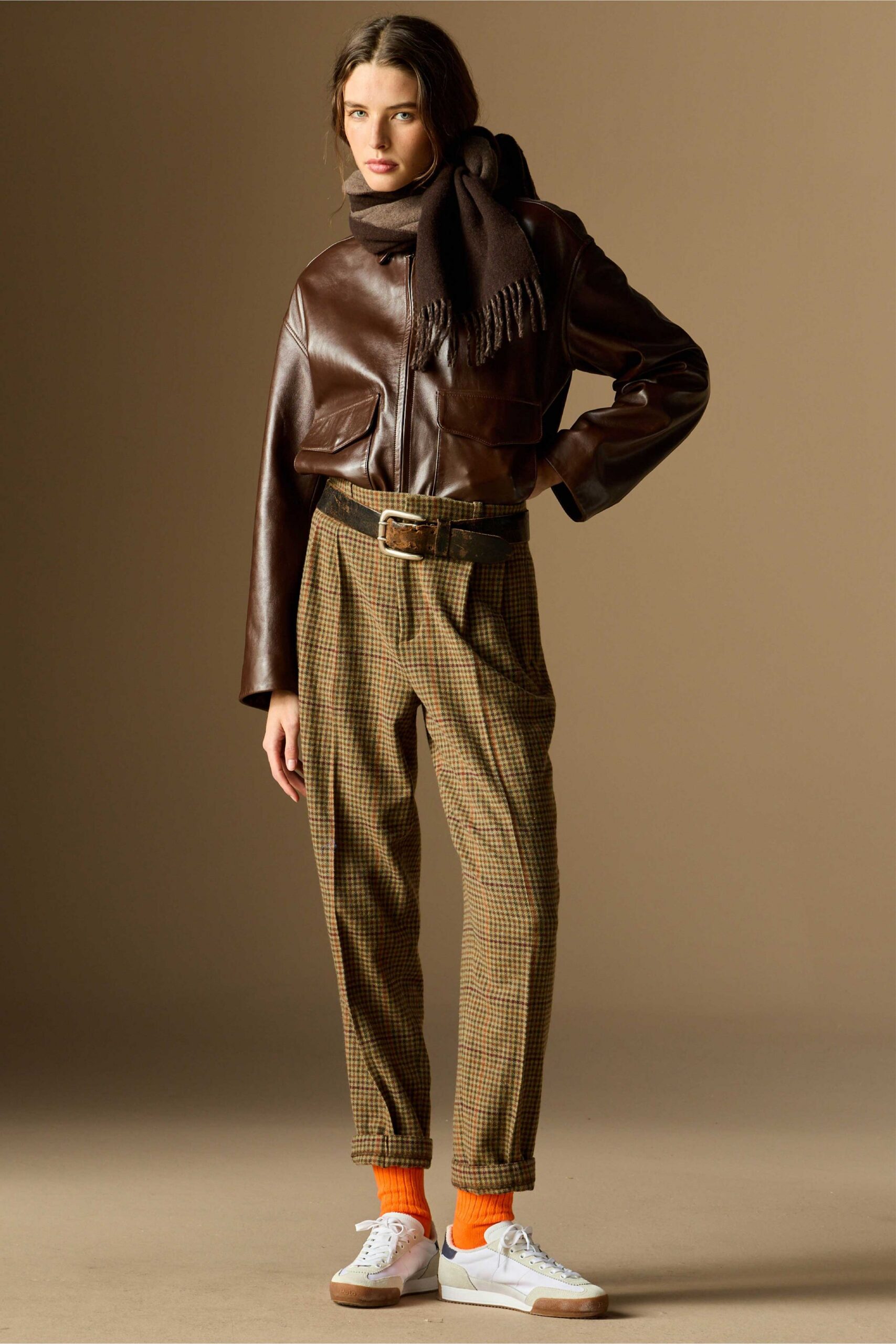brown leather jacket with checked pants